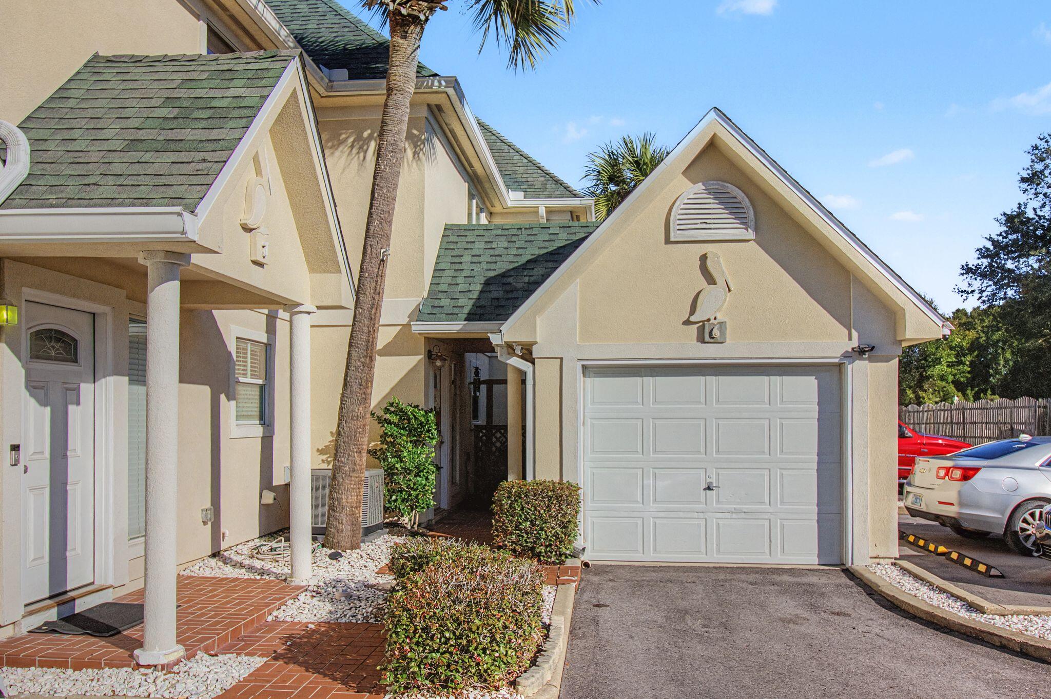AVAILABLE APRIL 10TH, 2026- Live in the Heart of Destin — Just Minutes from the Harbor!

Location truly is everything, and this beautifully updated and well-maintained home places you just a short distance from the iconic Destin Harbor, dining, shopping, and local hotspots.

Inside, you'll find a bright and open kitchen, dining, and living area designed with entertaining in mind. The kitchen features granite countertops, stainless steel appliances, a tiled backsplash, pantry, and a convenient breakfast bar—perfect for casual meals or gathering with friends. A wet bar and half bath downstairs add even more functionality for hosting.

Luxury vinyl plank flooring runs throughout the home with tile in the bathrooms—no carpet anywhere for easy care and a clean, modern feel.  Architectural details give this home extra character, including cathedral ceilings in the primary bedroom, a striking arched window, and elegant arched wall insets in the living room.

The spacious primary suite also offers a custom-designed walk-in closet with built-in storage, while ceiling fans in every room keep the home comfortable year-round.

Step outside to enjoy the covered back patio overlooking lush flower bedsyour own private spot to relax. The covered front entrance connects to a charming covered breezeway leading to the detached one-car garage, complete with automatic opener and pull-down attic storage.

Residents also enjoy access to the community pool, making it easy to soak up the Florida lifestyle.

Parking is limited to two vehicles: one in the garage and one in the designated overflow space directly in front of the garage.

If you're looking for style, convenience, and a prime Destin location, this one feels like home the moment you arrive.

Call 850-729-0399 View rental requirements or apply at www.RentwithBSR.com

No smoking or vaping. Pets may be allowed with some restrictions and a $400 non-refundable pet fee. FEES: $50 per adult 18+ application fee, Landlord Liability Policy (if proof of Renter's coverage is not provided) $15 mo, Pest Assurance pest control policy $20 mo.