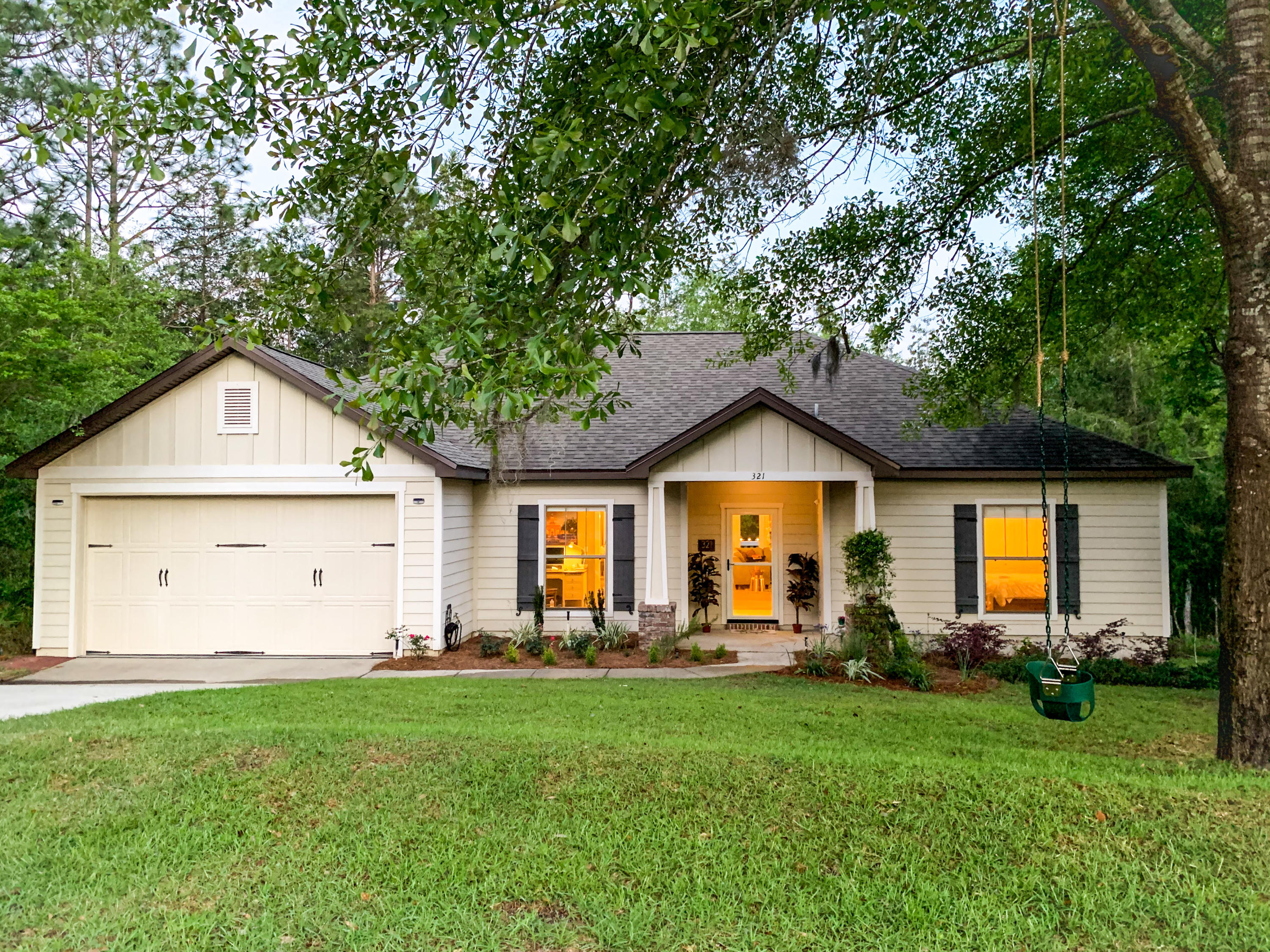 Seller is motivated and is offering up to $3000.00 towards buyer's closing costs. GREAT LOCATION just off PJ Adams Rd south of I-10. This pristinely kept Craftsman style home is nestled in the desirable Walsh Glen Estates. A spacious floor plan that includes a flex room w/custom built in shelving, 3 bdrs, 2 baths and is situated on 3.83 acres of woodlands. The acreage provides privacy and uniqueness w/ an ecologically beautiful, freshwater stream that meanders throughout. Several walking trails and areas where you can camp in your own private forest! The home is very welcoming with an open floor plan and high ceilings, New hardwood flooring and new custom lighting throughout. The kitchen boasts custom cabinetry w granite countertops, a 5 burner gas stove and Bosch ''silent'' dishwasher The split floor plan has the master suite w a large walk-in closet, separate shower, double sink vanity and a wonderful soaking tub. Two bdrs and a bath on the other side of the home. The oversized laundry room has ample storage and a folding counter.  The exterior of the home is hardy plank and dimensional shingle roof.  The open deck leading off of the living room offers great views of the wooded backyard and has a gas line hookup for your outdoor grill.  This home is perfect and ready for immediately occupancy.