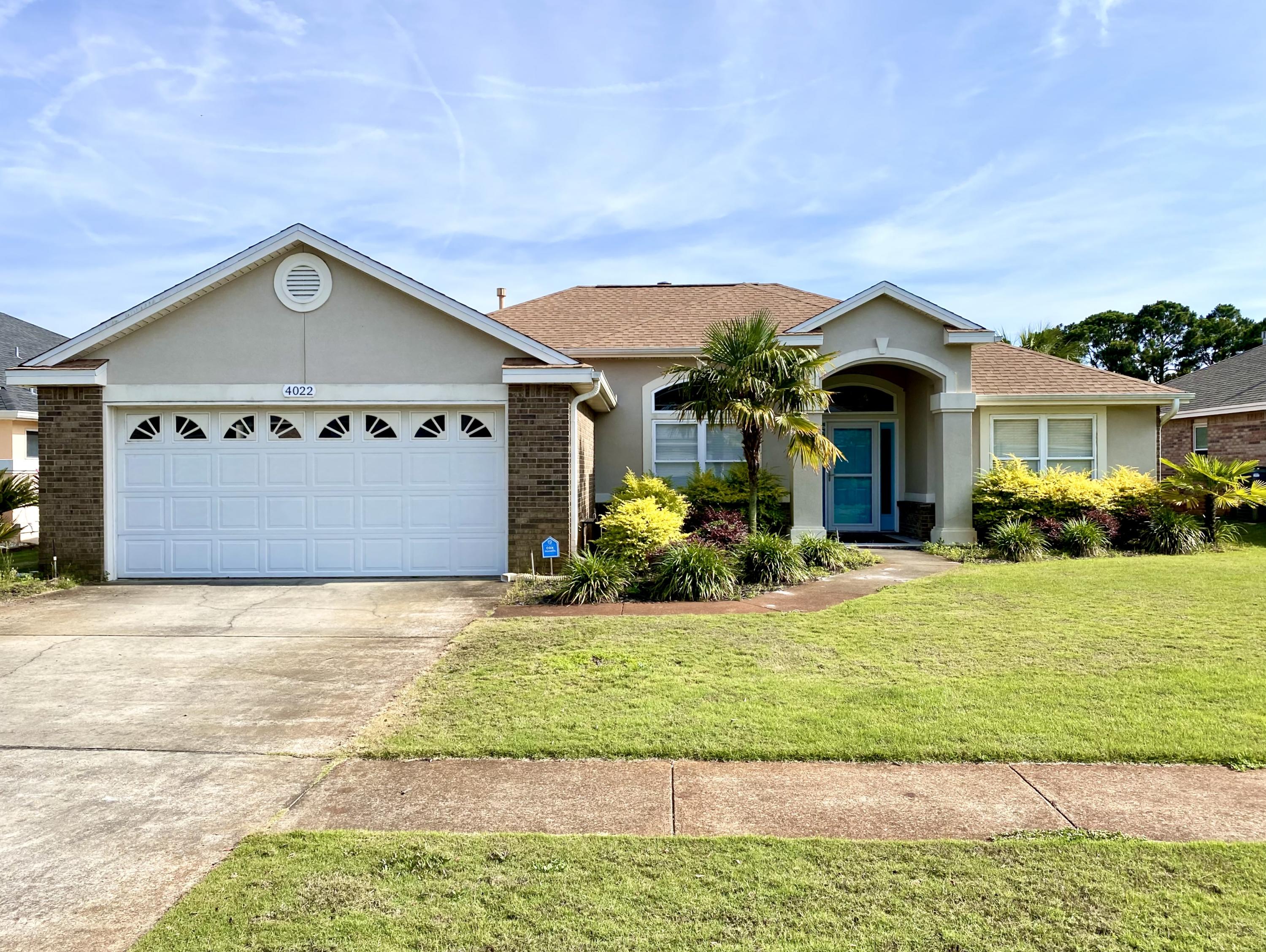 Beautiful brick & stucco split floor plan home is a short walk to the Beach, Morgan's Sports Complex & Indian Bayou Golf Course. Enjoy the natural light throughout the living area, kitchen, and dining area with 10 foot ceilings and tiled gas fire place. The kitchen has beautiful granite and slow close cabinets & stainless appliances. The master bedroom has ceiling crown, lighted accents, master bath has double granite vanity, jetted tub with separate shower and large walk-in closet. The two guest bedrooms with spacious closets and guest bath has wood look tiled floors and granite counter tops. Enjoy gorgeous view of the pond from covered & screened patio. Laundry room with front loading washer & dryer leads to the 2-car garage with attic storage. Rent includes monthly lawn maintenance