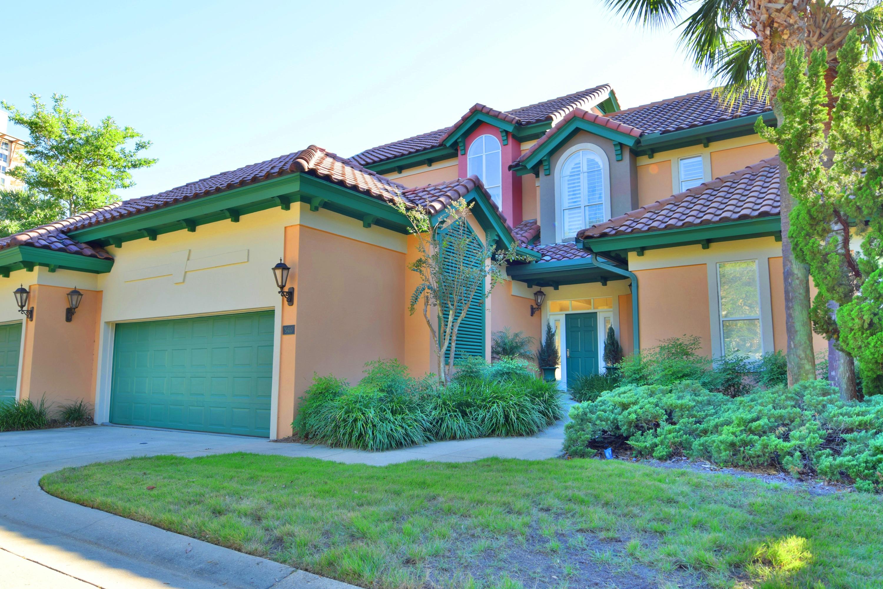 Beautiful 3 bedroom, 3.5 bath townhome in Tivoli Terrace. One of the larger floor plans with a 1st floor master bedroom. Home overlooks the 14th hole on Baytowne and is just a short stroll to the beach. Stylish decorating throughout with an updated kitchen (Viking sub-zero, stainless appliances, breakfast bar and white cabinetry). Travertine flooring throughout the living area and dining area and plantation shutters. Hardwood floors in the master give a feeling of sophistication with a walk-in ''California'' closet. Master bath has a double vanity and large walk-in shower... all updated! Hardwood floors grace the stairway to two bedrooms and alcove upstairs, each with full bath and also built-in ''California'' closets. There is an attached 2-car garage with ample storage space.
