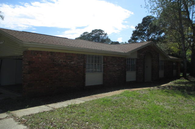 Beautiful and spacious home on a corner lot features laminate floors, new carpet, sparkling pool, fenced yard and recent upgrades! 3 bedrooms, 2 baths, with a ton of storage, trash compactor, 2 car garage, formal dining room, gas or wood burning fireplace, sunroom, breakfast bar, ceiling fans throughout, gas connection for a gas dryer, and centrally located in FWB. Pool and yard maintenance included in the rent! Gas stove and water heater. Pet allowed with non refundable pet fee and approval.