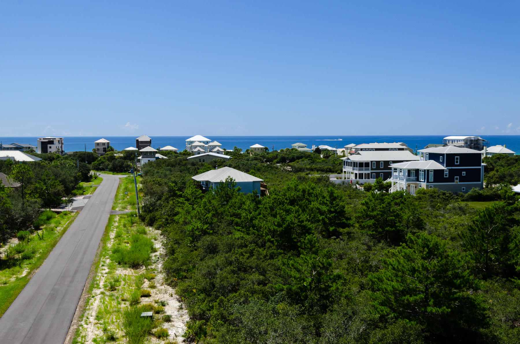 Build at the beach with the Gulf in sight! Gulf views possible from a 3rd story or tower. This vacant lot is available less than a half mile to the Gulf. Located along scenic 30-A, this vacant lot awaits in the area between one of the few rare coastal dune lakes (Camp Creek Lake) and Alys Beach. Here, there is no build out time and no HOA or specific architectural guidelines other than the standard Walton County height and building setbacks. Location is a short distance to many restaurants, shopping and entertainment in Alys Beach, Rosemary Beach and the latest HUB just west of Camp Creek Lake. Public beach access located across from Seacrest Drive (West from Brenda Lane). ***Buyer is responsible for personally verifying details about this property. Any information contained in this listing is believed to be accurate but is not guaranteed. ***