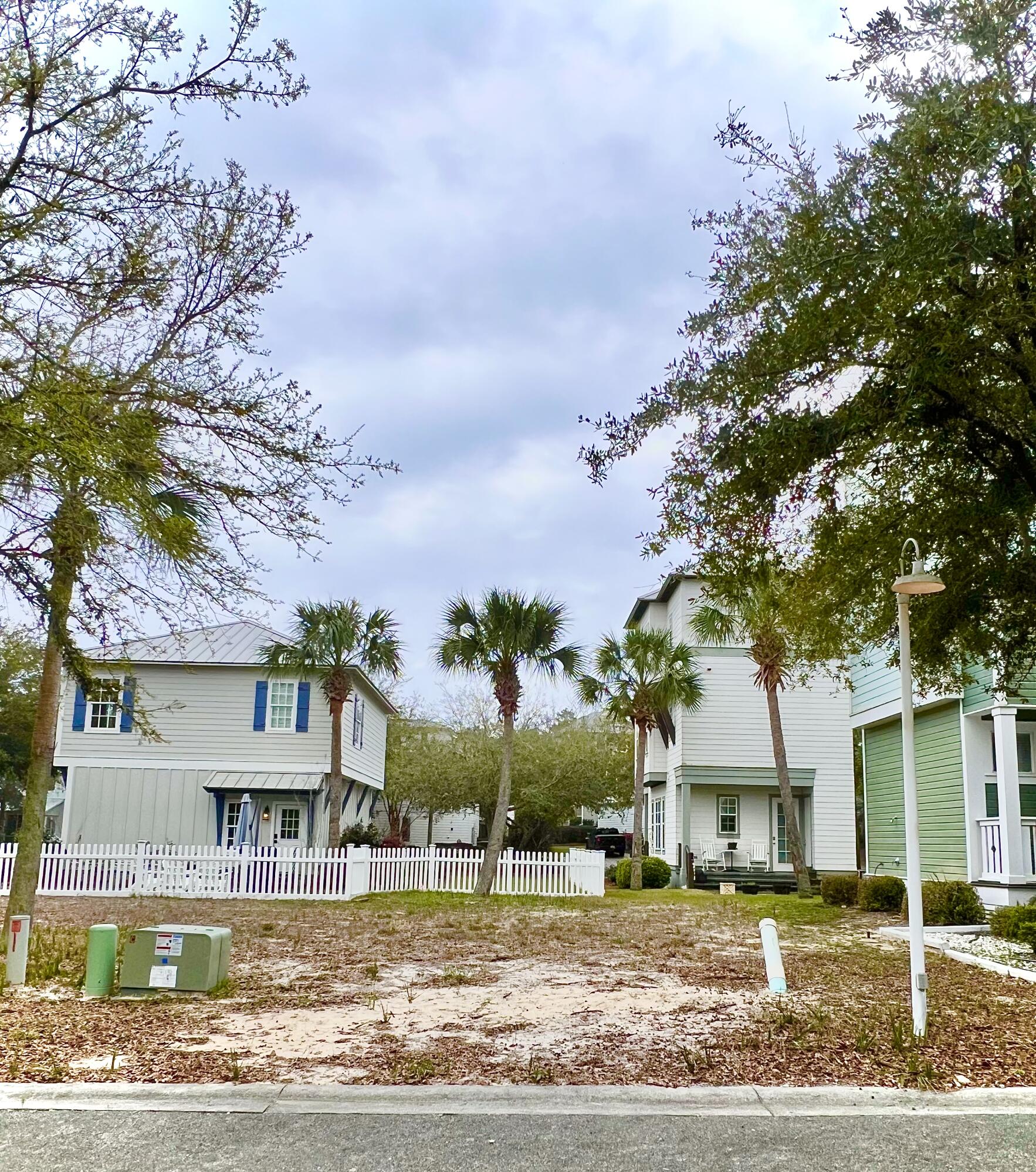 Best priced lot in The Village at Blue Mountain.  Located within a 1/2 mile to the Gulf, the gated community offers residents deeded beach access off Blue Lupine Way, a large community pool, gym, shuffleboard courts, bocce ball courts, a putting green and long-term golf cart parking with charging stations for owners.  Residents enjoy direct access to 30A and Hwy 83 with a public beach access at the end of 83. Several restaurants are located within walking distance such as Redfish Taco, Mimmos, Blue Mountain Creamery and more.  Professional pictures are coming! All information to be verified by buyer or buyer's agent.