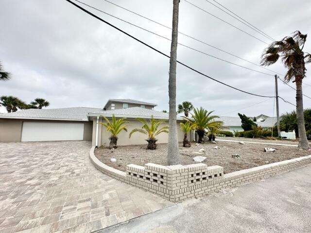 AVAIL: 5/23, preferably 6 mo. 1 day lease term w/ some flexibility. S/D = $4K, can be broken up in 2 monthly installments if qualified. Pets upon approval w/ a fee. Utilities included up to $500/month. GORGEOUS newly renovated fully furnished waterfront home on the highly desirable & beautiful Okaloosa Island. Very last house! Covered double door front entrance. Front door opens to the living/dining/kitchen area. Top floor master suite w/ a garden tub, separate shower, 2 sinks & a walk-in closet. 2 additional bedrooms & full bathroom also on the top floor. On the bottom level you have a family room w/ (decorative) fireplace, privacy screen for an optional 4th bedroom, full bathroom, laundry room, 1/2 bathroom & a bonus room w/ a built in bar/wet bar. A balcony on every floor w/ water views. Granite/stone/marble/wood galore - no carpet - all high end touches & finishes. 1 car dual entry garage on one side & 2 car on the other. HUGE paver driveway w/ loads of parking. New boat dock just completed w/ upper deck + green fishing lights over the water. It will fit a boat, two jet skis, etc. Bring your paddle boards & fishing poles & have the best of the best party deck! The storage area off the 2 car garage & 1 closet inside of the master bedroom closet are locked/off limits to Tenants & Owners use only. WELCOME TO PARADISE!