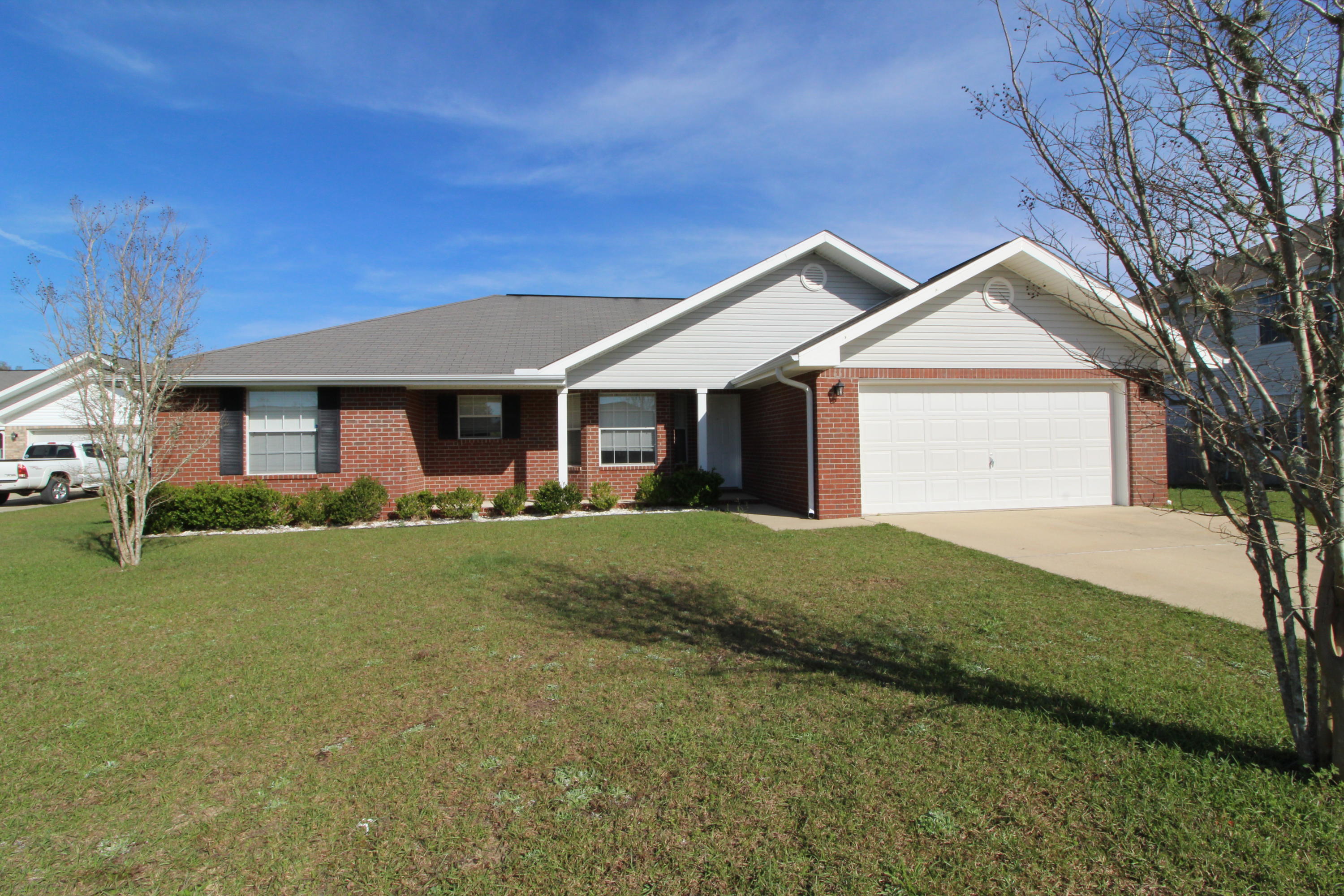 Charming all brick home very close to hospital and walk the kids to the schools! This home has a very open feel with a central Great Room that flows right into the kitchen and dining area. Split bedroom plan. The Master bedroom is large with double windows that allow for lots of natural light. The additional bedrooms are nice sized. The lot backs up to a natural preserve, so you have privacy when you are in the back yard. The street is a cul-de-sac, which means very little traffic passing by the home. This home is immaculate and cozy! Great location close to bases and many shopping centers.