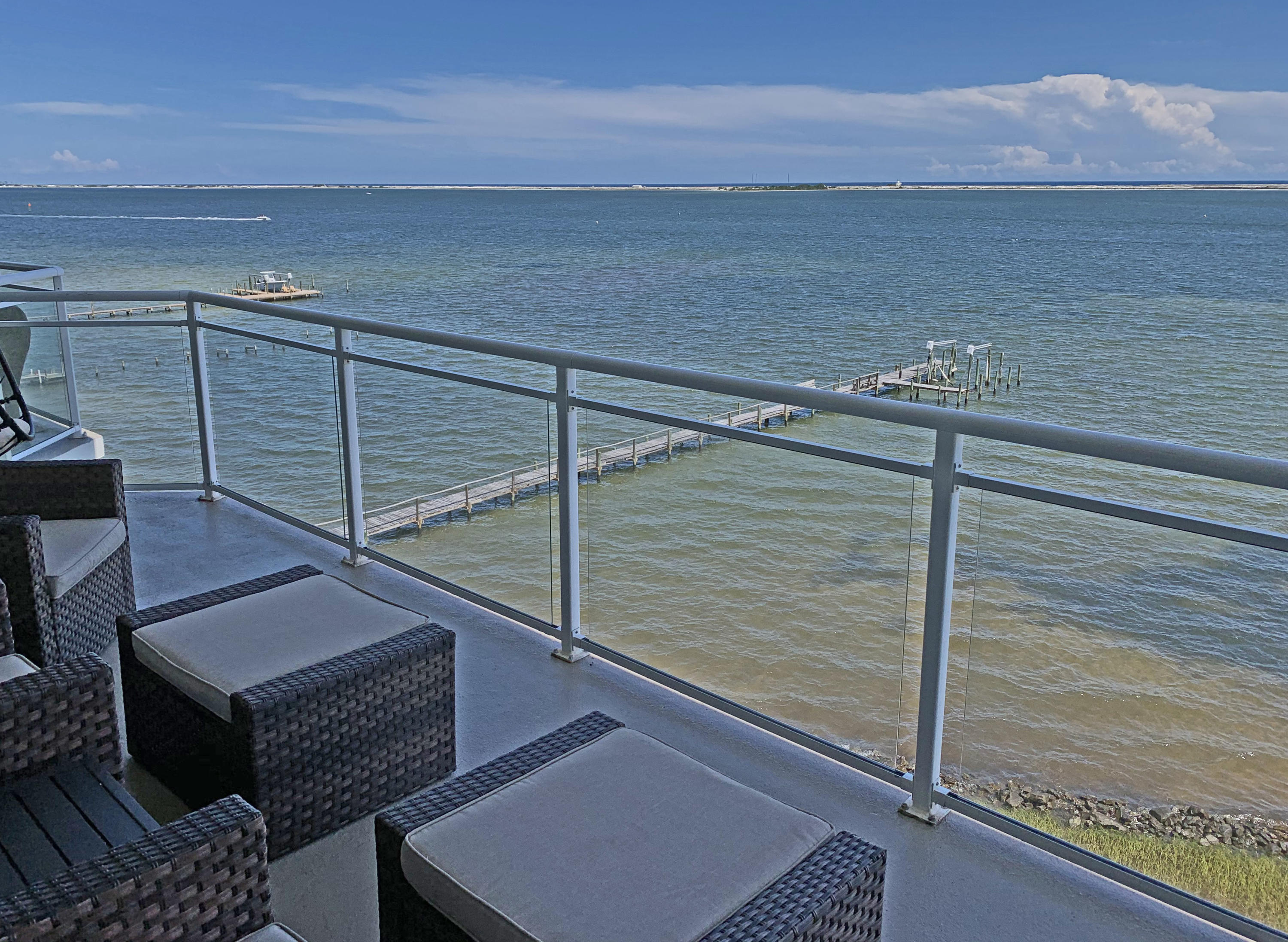 Beautiful waterfront living in a reconditioned condo on the Santa Rosa Sound.  FURNISHING INCLUDED (ASK REALTOR FOR DETAILS). Gated community, waterside pool, marina, covered parking, elevator service. Property is fully landscaped, fire sprinkler system, dumpster and water sewer which are all included in HOA fees. Tile and carpet flooring, granite counters throughout, Stainless appliances, newly refinished cabinets with tile back splash. BY APPOINTMENT ONLY. BOAT SLIP AND A/C STORAGE UNIT MAY BE AVAILABLE TO PURCHASE.
