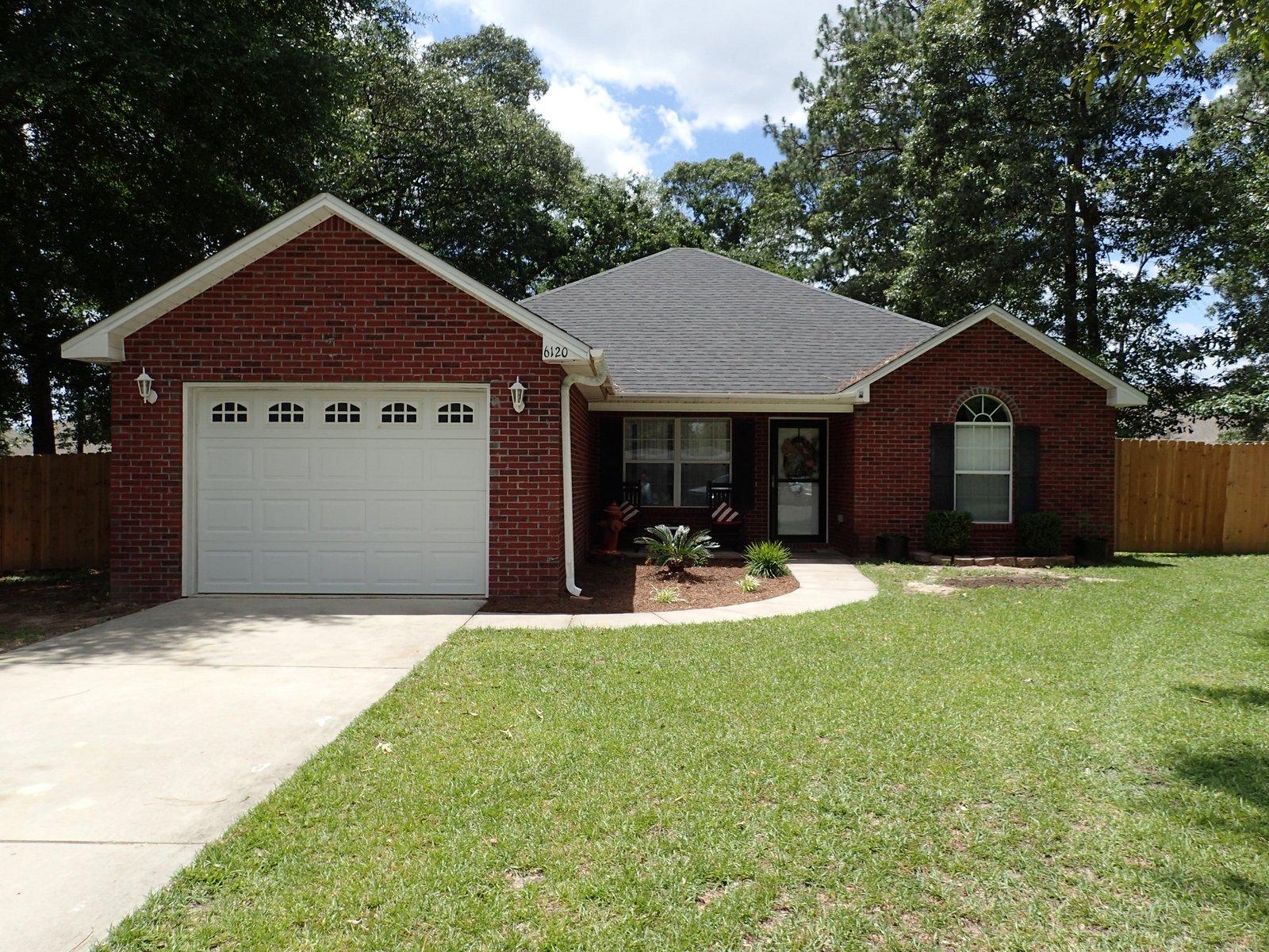 This home is Super Cute! Just mins from the heart of Crestview, this 3 bedroom 2 bath home rests at the end of cul-de-sac and has privacy fenced back yard, all brick exterior and 1 car garage. Built in 2006, this split bedroom design home comes with vaulted ceilings, tile in the kitchen and baths and has carpeted bedrooms and laminate floors in the living room. Master bedroom is large for this square footage with very accommodating master bath with double vanities and walk in closet. One of the few all brick homes in this area and a must see! Call today before this one is gone!