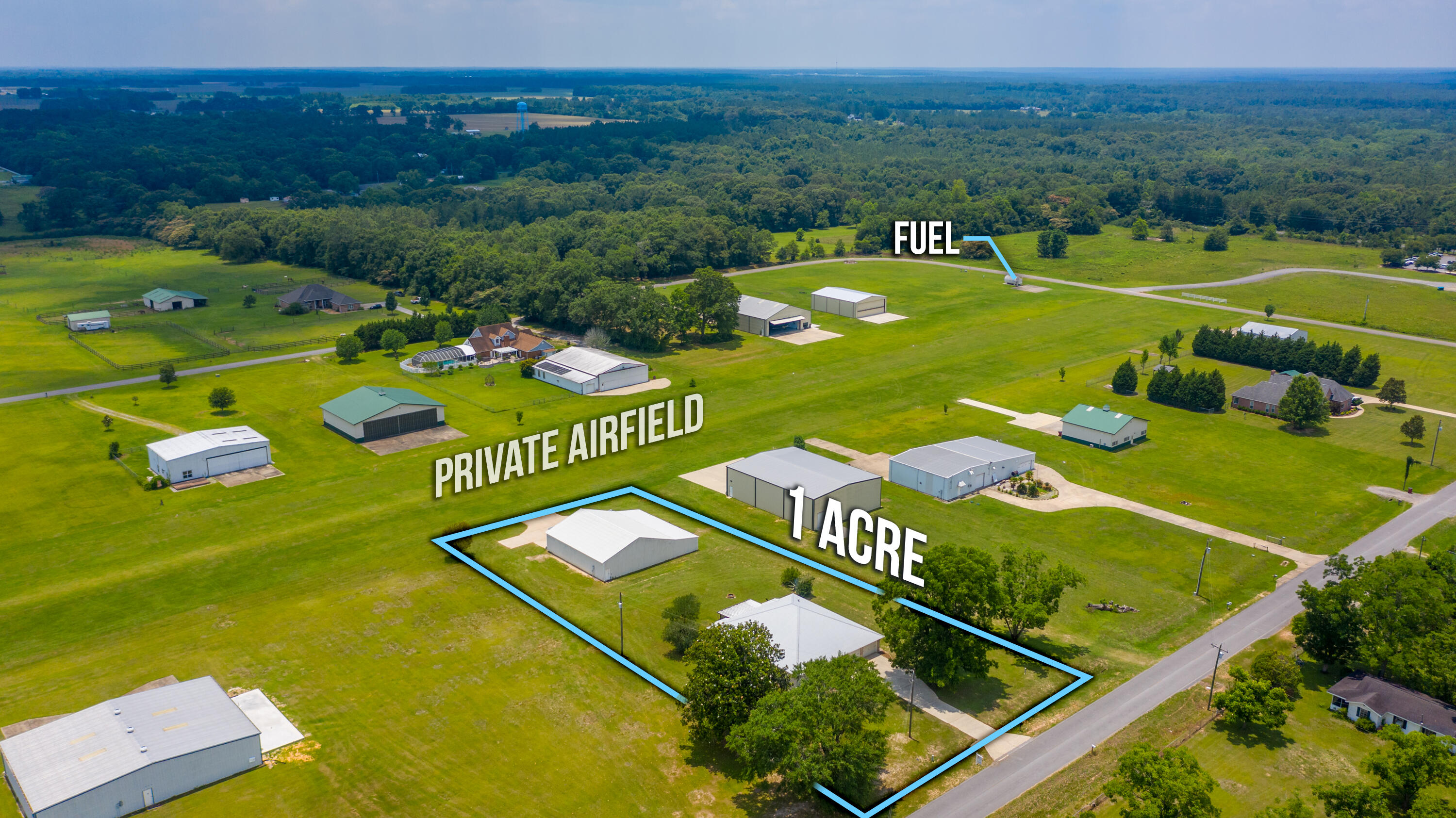 Under contract with 72hr kick-out clause. ACCEPTING BACK-UP OFFERS.  UNIQUE and amazing community with a 3300 x 150 ft LIGHTED, GRASS RUNWAY w/ AirNav 18FD radio comms.  Maintenance and fuel available on site.  In addition to an updated home, you have the benefit of having a very large hangar (100 x 60 ft)  to store your private plane(s), car or Harley collection. KEY FEATURES INCLUDE:   44 ft automatic hangar door;  19 x 57 ft heated/cooled workspace (garage & office) with a full bathroom; property conveys with share in the fuel farm; additional 12 x 12 bonus storage area in the main house's attic -- heated/cooled; air compressor piped into the main hangar; whole house & hangar commercial generator with  underground propane tank; oversized garage;  2 x screened in patios; metal roof