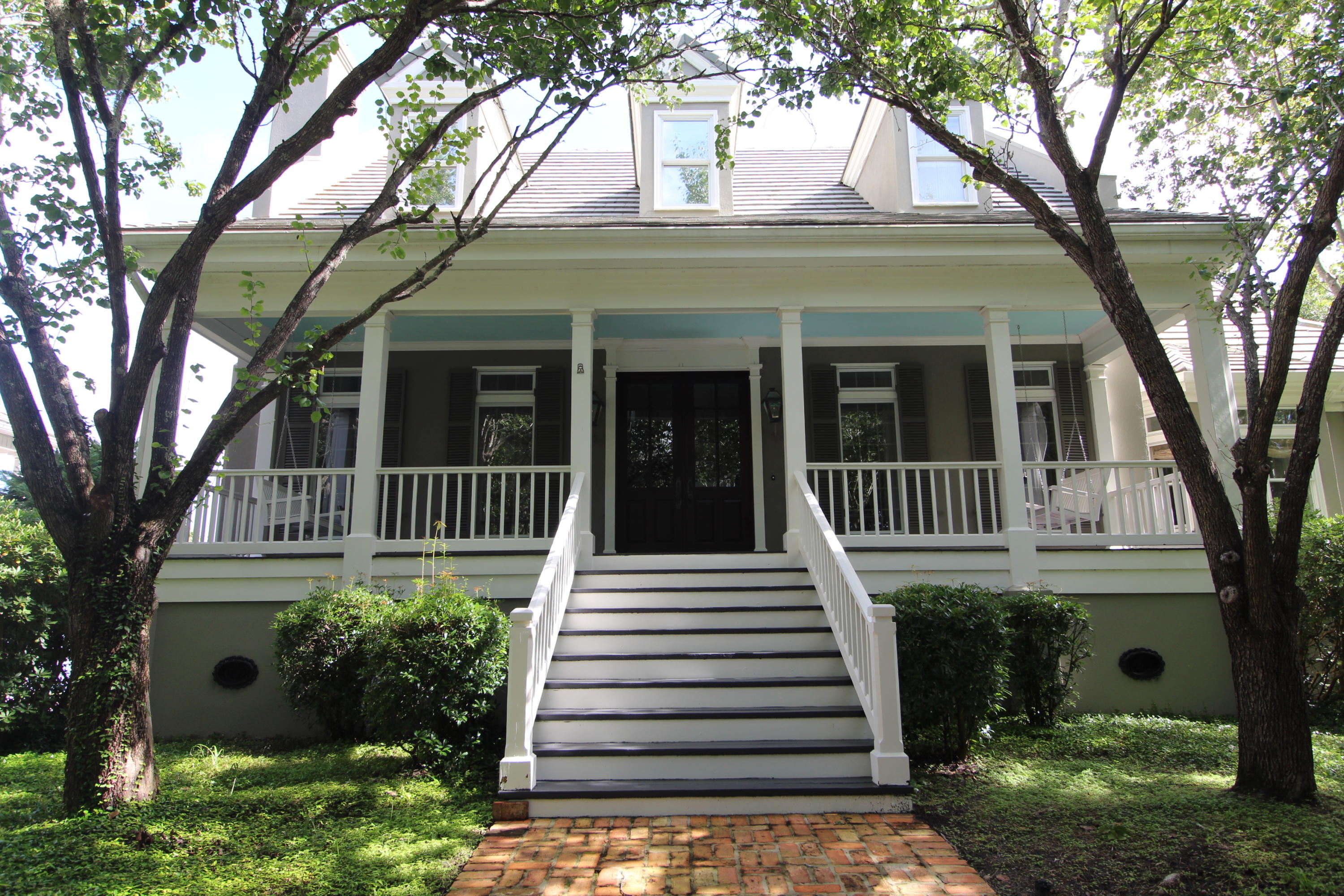 If you've imagined living in an alluring 4913 sq.ft. secluded Bay front Antebellum style home w/100' of water frontage in one of the most picturesque settings in old Destin: DRIVE ON HOME! Stunning architectural details define the personality of this gorgeous 4 BR, 4 1/2 BA home. 10'ceilings, layered crown molding, wainscoting, transom windows, heart of pine flooring, a large climate controlled 2000 bottle plus wine cellar and so much more. A 135' new dock with electric kayak lift is an added treasure. 100 feet of bay frontage.Drift off to sleep each night w/tranquil sounds of nature, purple-orange sunsets and wake up each morning to awe-inspiring sunrises. Home is listed for rent in MLS. #844602 This home has three floors and an elevator for convenience. There is a master suite with a marble gas fireplace on the first floor complete with walk in custom closet, bath with whirlpool tub and separate shower. Additional square footage was added to the master bedroom. There is a  large master suite on the second floor with a full bath and walk in closet. 

Mature oak trees and magnolia trees accent the long winding new concrete driveway with an over sized paver parking pad.

This highly sought after location is on one of the most desired streets in Destin. Just minutes away from our white-sandy beaches, shopping and a quick trip to Crab Island. Fishing is fantastic!