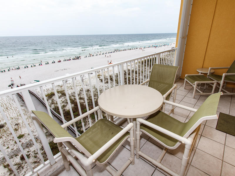 Beautifully appointed with fine furnishings and bright colors throughout! Granite counter tops accentuate the fully equipped kitchen. His and Her sinks make life easy in the master bath. Tropical Floral patterns say ''Welcome to the Beach''! This two bedroom beach front condo sleeps up to 8 guests comfortably. The EXTRA bunk room offers an additional sleeping area that our little guests just absolutely LOVE! The master bedroom and living room are on the beach side and both have an entry to the beach front balcony. OH THE VIEWS FROM THE 5TH FLOOR! Just gorgeous! No obstructions, no side views, this is direct beach front - as good as it gets! Marvel in the sights of the pristine sugar white beach and emerald green waters. Amazing views from the dining area as well as the kitchen. Meal prep l be a breeze with lots of counter space and all major appliances and cookware. Washer and dryer also included in this condo for your laundry needs. Gulf Dunes Resort offers guests a getaway experience with spacious tropical grounds, sea dunes, tennis courts, grill area, two pools (one heated October thru March), and ample parking.