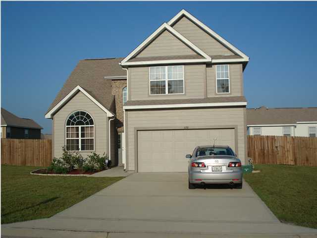 This House is located Sout of I-10 in the Sandy Ridge subdivision built in 2006. It is approx. 5.6 miles from Duke Field and 18 miles from Eglin AFB. The house is approximately 2100 sq ft, with a master bedroom that has a walk in closet, full bath w/a florida tub and separated standing shower. All of the bedrooms are upstairs including a full bath as well. Downstairs has a half bath with a game room/family room, dining area, living room area and spacious kitchen. The home also has a attached 2 car garage. The front of the house has a beautiful garden that has been recently planted. The back yard is completely fenced in great for kids and animals to run around in and play. Owner will consider pet on case by case basis.