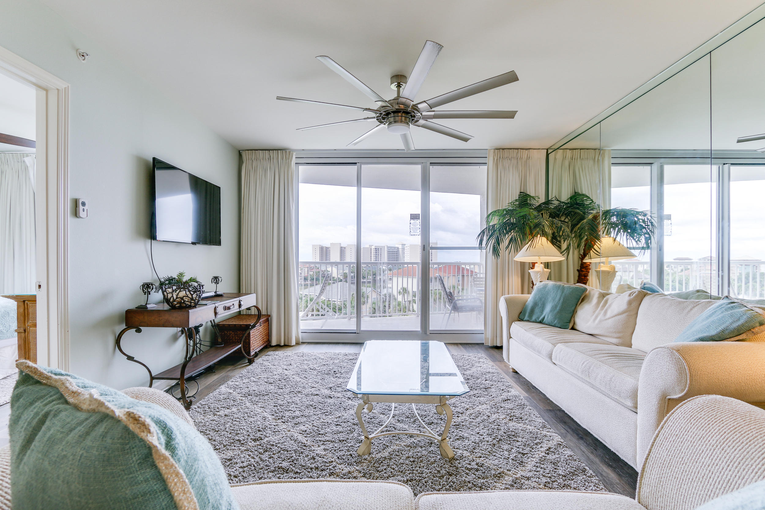 You will be so excited to call this condo your beach getaway! This is a large 2-bedroom unit with 1,072 sq. ft. UPDATED and well-appointed with beautiful views overlooking the pool, onsite lake and the Gulf of Mexico. You will walk in & never want to leave.
This Resort is incredible offering you deeded beach access, 3 pools - one heated seasonally. There is also a Sauna/Steam Room and you will want to take advantage of bar-b-que grills, fitness area, tennis, community room, or walking on the amazing beach.
This unit, #404, has gorgeous high-end flooring throughout the condo, GRANITE countertops in the kitchen, a large master bedroom that looks out toward the gulf and has a private entrance to the balcony. The Family room is open and perfect for entertaining. The cherry on top of this property is the washer/dryer conveniently located in this unit. This is the perfect turn-key rental property or second home at the beach.