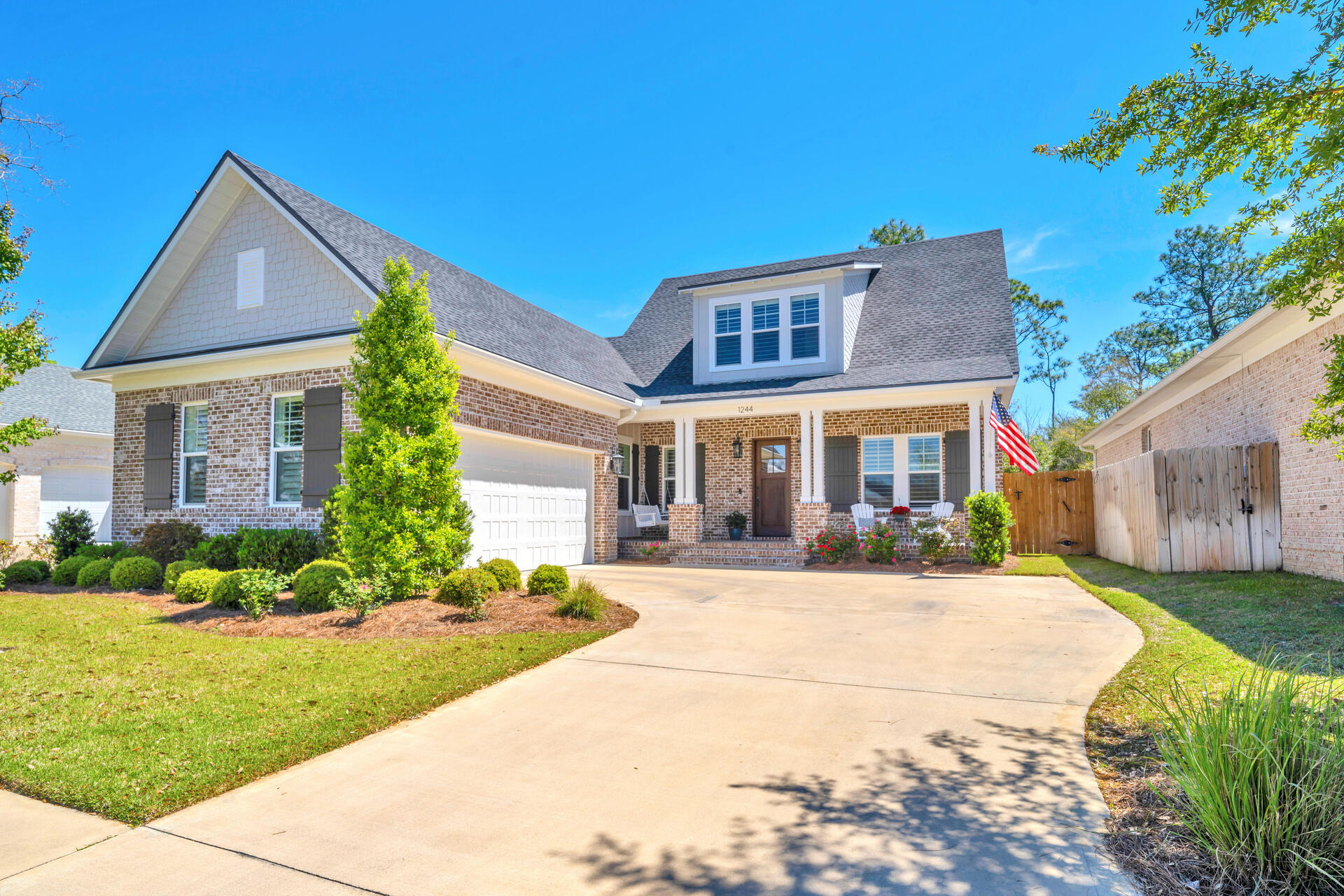 Discover the charm of this two-story home featuring 5 bedrooms, 3.5 baths, with a wooded backdrop offering lots of privacy.   Perfectly blending craftsmanship with functionality, this residence also offers a loft and media room allowing ample space for work, play, and relaxation. The spacious kitchen has an eat-in breakfast area, gas cooktop, wall oven, and built-in microwave. Many upgrades throughout the home including an electric fireplace, plantation shutters, custom his and hers closet system in the primary bed, and a retractable screen for seamless indoor/outdoor living. Enjoy the luxury of your own private pool, complete with a heater/cooler for year-round enjoyment. Additional upgrades include a transfer switch for a generator and hard-wired alarm system. Living room, media room and porch are wired for surround sound. The fifth bedroom is currently being used as the office.