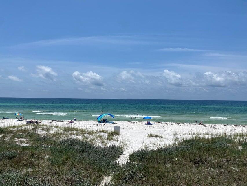 Nestled in the heart of Seagrove Beach, this exceptional oversized Gulf-front lot offers a rare opportunity to craft the ultimate coastal retreat. This property is part of two parcels available for purchase, providing an impressive combined 60 ft of Gulf frontage by 510 feet deep lot and private beach extending to the mean high water line.(Adjoining lot MLS #977129) Positioned on the exclusive San Roy Road, a serene dead-end street, uniquely bordered by the breathtaking turquoise waters of the Gulf to the south and the tranquil Eastern Lake to the north.This rare positioning presents the best of both worlds with panoramic views of the Gulf's shimmering waters and the scenic beauty of Eastern Lake. Located south of 30A, this property is ideally situated in a quiet residential neighborhood, close to all the renowned communities of 30A with Seaside to the west and Alys Beach and Rosemary Beach to the east with the finest dining, specialty eateries and boutique shopping and the new Greenway Station is nearby featuring local favorites like Pecan Jack's Ice Creamery, the Salty Butcher, Wild Olives, and more. Envision your dream home on this expansive lot, which offers ample space for a custom build that meets current county building requirements of one parking space per 900 sq ft, there's plenty of room for a spacious home and necessary parking. For inspiration, a home two doors down built in 2024 on a 60' x 331' lot boasts over 9,807 sq ft of heated and cooled space, showcasing the possibilities for luxury living.
Note the position on the beach of the homes to the east and west allow for expanded views down the coastline.This unique lot also ensures privacy and tranquility, with the nearest public beach accesses at either end of the road. Whether you dream of a generational beach retreat or a high-income-producing investment property, this lot offers the flexibility to realize your vision. 
Currently, the property includes a 3-bedroom, 2-bathroom 2,145 sq ft town-home, perfect for use as a beach getaway or short-term rental to generate revenue while you design your new home. The neighboring parcel also offers a 3-bedroom, 3-bathroom, 1,500 sq ft townhome, providing further accommodation options.(Both properties priced for beachfront lot value only). Please note that the seller requires both parcels to be under contract with a simultaneous closing.
Seize this unparalleled opportunity to create your dream home. Whether for personal enjoyment or investment, this Gulf-front lot is poised to become a crowning jewel in your real estate portfolio.