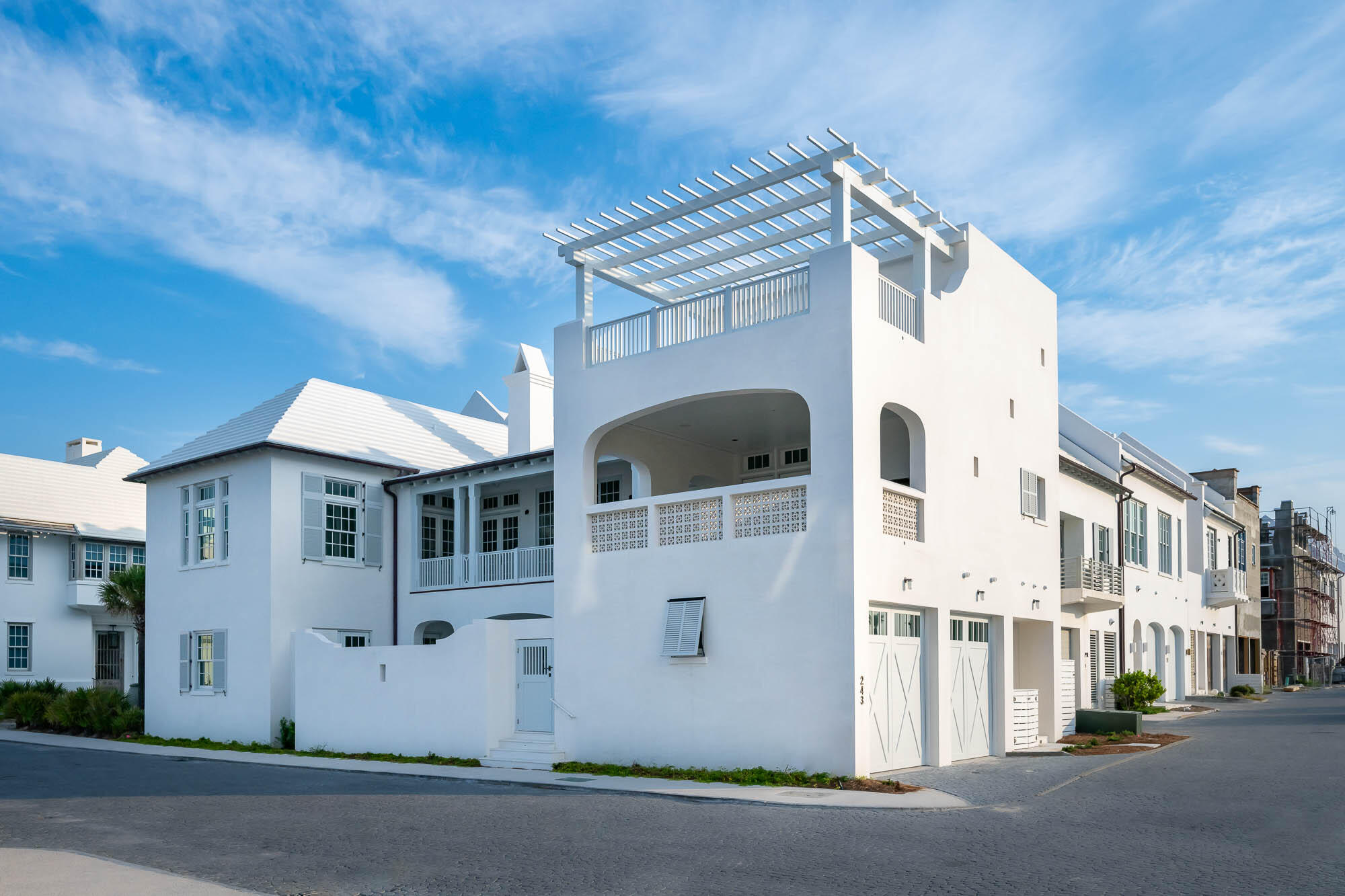 Acquired excellence has been achieved with the exquisite architectural design of 243 Sea Garden Street by architect Gary William Justiss. Meticulously bound in all details beginning with Venetian Plaster walls & ceilings throughout to acquiring all possible water views of the Gulf of Mexico's emerald waters 100 yards away.
243 Sea Garden Street encapsulates grandeur and functional living for partial or primary residency. Water views resonate from the 2nd level kitchen, dining, & living rooms transitioning from the 2nd level terrace to the 3rd level media/entertaining room & terrace.
Indoor & outdoor living comingle creating compatibility into one space taking full advantage of the homes numerous outdoor gathering locations from the courtyard with pool, 2nd level terrace with summer kitchen, punctuated by the 3rd level terrace with media/entertainment room.  The owner will have elevator access to all 3 levels of the home.  Nestled on the iconic Sea Garden Walk Pedestrian Path & Sea Garden Street, the home is in alignment for direct access to the beach & the nearby private owners Beach Club. Entering the home's first floor welcomes you to the foyer anchored by an open staircase. A secondary family room opening to the courtyard yard with private pool allows for swimming & sunning in privacy. The secondary family room is a gathering space to accommodate the 3 guest suites, plus bunk room.  Each of the 3 bedrooms hosts en suite bathrooms plus one of two powder rooms. Ascending to the 2nd floor brings you to the main living level framed by intermittent beams where the living areas are flooded by natural light cascading through the floor to ceiling doors.  The living room opens onto full length balconies having sights of the Gulf. Separate from all is the beautifully appointed Primary Bedroom private from the other living areas. This is truly a space of retreat with a balcony, overlooking the courtyard below. Honed Calacatta Marble softens the bathroom, with soaking tub, to be spa like.  The generous closet with custom cabinetry provides a washer & dryer for ease.  The living area transitions to the dining room & kitchen centered with a generous island capped with honed Calacatta Marble. All chilling appliances are Sub-Zero featuring a Wolf range. Exquisite & extensive cabinetry & hardware provides stately use for the chef in mind. 
The East to West alignment of the kitchen, dining, & living rooms open to the dining terrace with all 3 locations having Gulf views.  The sliding doors create connectivity to the terrace providing additional entertaining space for outdoor dining & grilling capturing the Gulf breezes. The main living terrace boasts a summer kitchen and outdoor dining to be consistent with Alys Beach's iconic indoor & outdoor living.
Capping the amenities of 243 Sea Garden, the 3rd level room further emphasizes the livability of the home showcases a media/entertainment room that opens to the roof terrace suspended above the Town.  Views of the Gulf and the architectural roofscapes of the Town are stunning from this location.  This home is a must see.