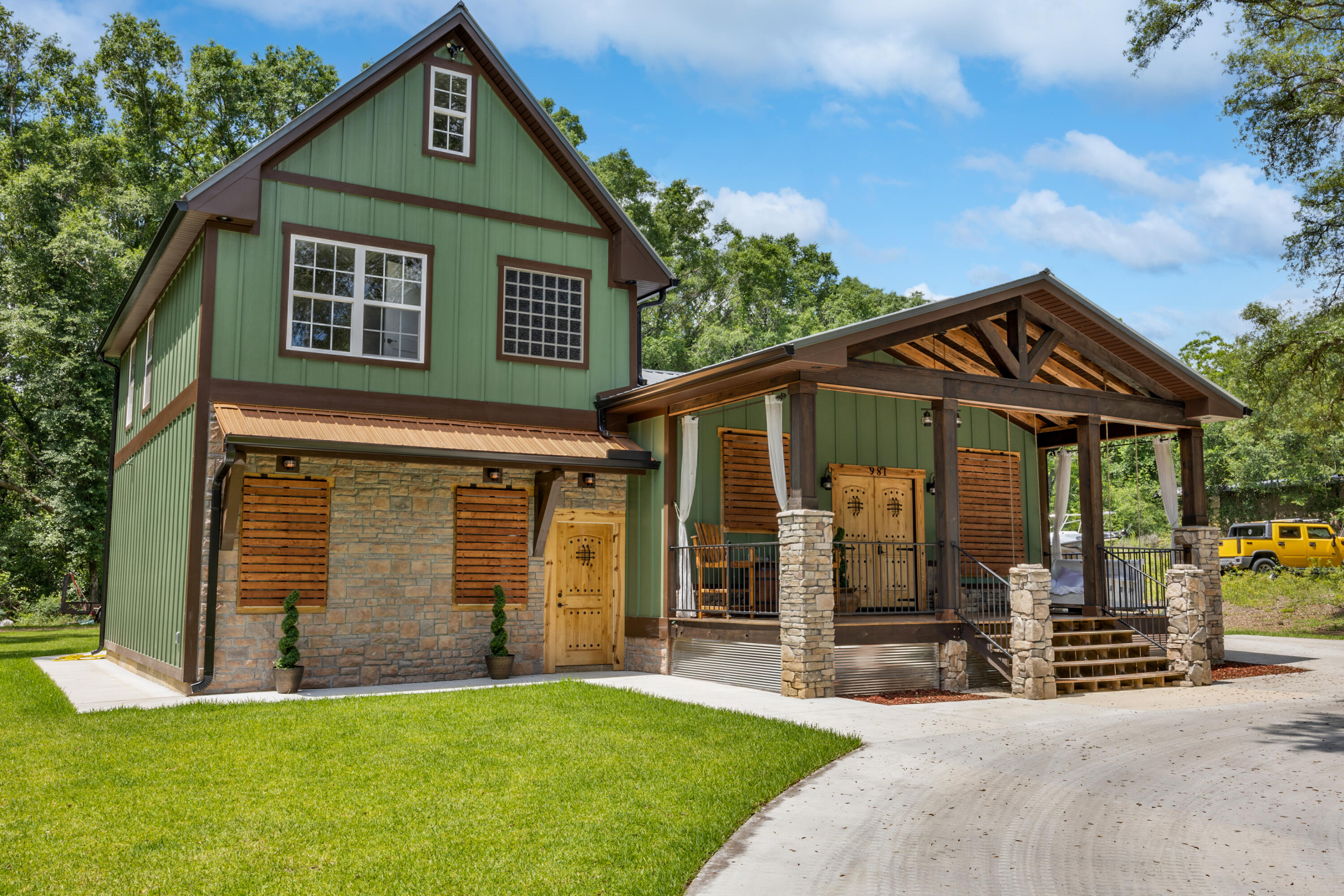 Owner Financing available with 25% Down; 5% interest Rate, amoritized over 30 years with a three year balloon.  Gorgeous, custom built 5 bed/3 bath home completed in 2022.  Walk up to the large, covered front porch with rock pillars and wood beams above to enter the home through the beautiful, custom made wood double front doors.  Once inside, you will be in the kitchen/dining area with stainless appliances, center island and granite  countertops.  Main Level Master Suite has a wood barn door into the Master Bath, with double sinks, a step up jacuzzi tub, separate tiled shower and a walk in closet.  Before you head upstairs, step down into the large living room complete with an electric fireplace with a built in heater that heats up to 900 sq ft. with multiple color settings and fan speeds. There is also a bedroom and full bath that could be used as a Mother-in-law or guest quarters.  On the 2nd floor you will find two more spacious bedrooms and a full bath.  Then make your way up to the loft that could be used as the 5th bedroom or an additional living space.  The woodwork throughout this home is beautiful, with custom baseboards, window and door trim, built-in bookcases, stairs and the Trayed Ceiling in the kitchen.  Tile floors throughout the home with carpet in the upstairs loft.  This is a great home with both separation and space, almost like getting two homes in one. Be sure to check out the 3D/Virtual tour included in the pictures for this home to get a better visual of the layout.
