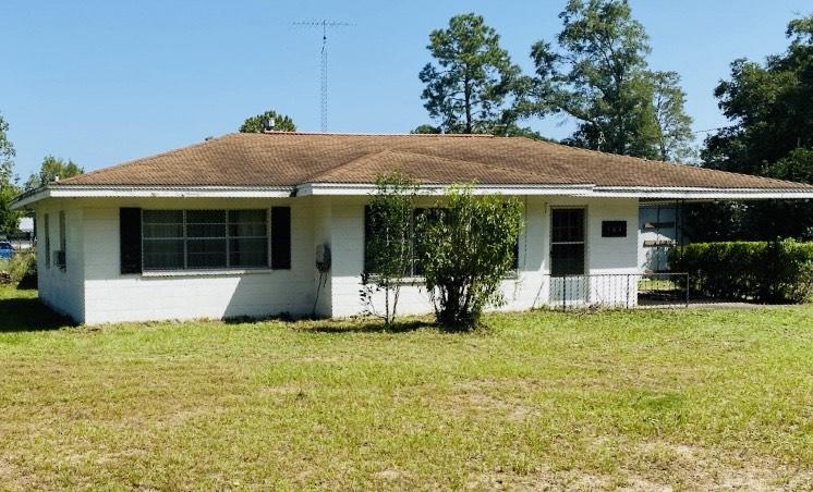 Investment opportunity!!! Great location in a quiet community. Buyer to verify all measurements. This property has a lot of potential and would make a great fixer upper. Home is being sold As Is. 
Home is on sewer now, not septic. Seller has never lived in home. There is a underground butane tank and also a filled in septic tank in back yard. Shed on side of home would have to be removed because it was installed partially on neighbors parcel. Water heater is new and washer and dryer do convey.