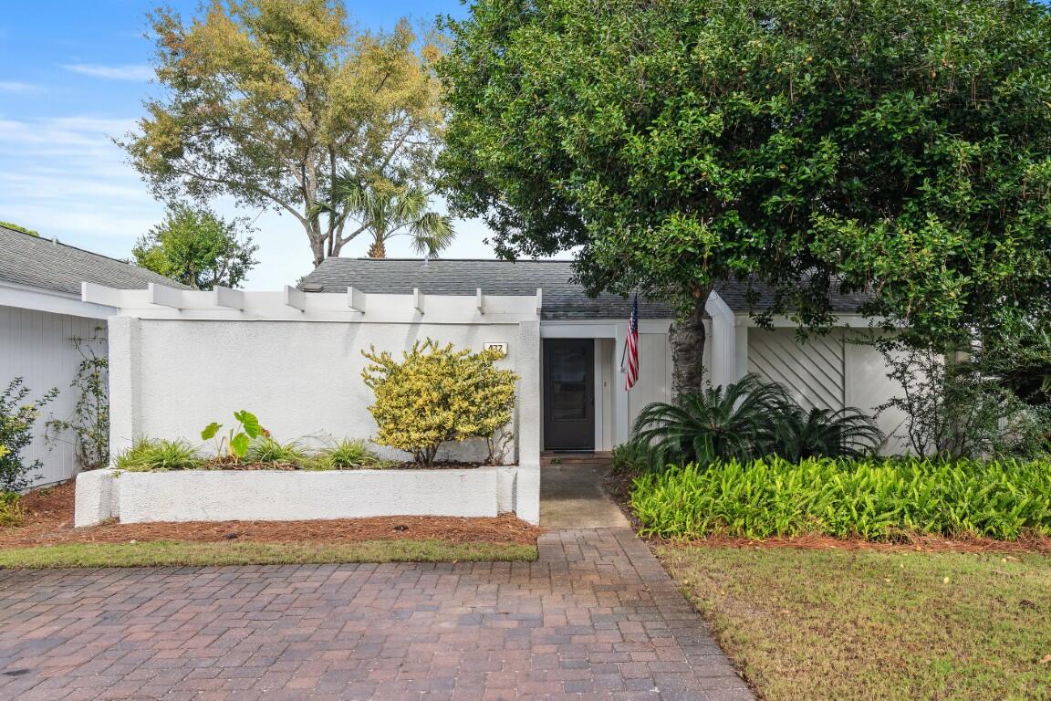 Affordable, secure Sandestin Resort living at it's finest!  Recently renovated, single level 2 BR, 2 BA,  Patio Home on peaceful, low traffic cul-de-sac. Rear yard with patio/deck privacy fence . Features spacious., separate storage room. New amenities in 2025 include complete interior paint; carpet in BR's. All new doors/windows, jams/molding. New BA fixtures including toilet. New M BA handicap walk-in shower and flooring. 3 new Roku tv's-one in each room.  New Whirlpool microwave; Amana washer & dryer. New condenser for heat pump. 2024: All exterior siding replaced and painted. New Amana stove/oven & disposal. Asphalt shingle roof replaced in 2012-according to insurance carrier records.  Great retirement, 2nd home and/or possible rental. Come see!