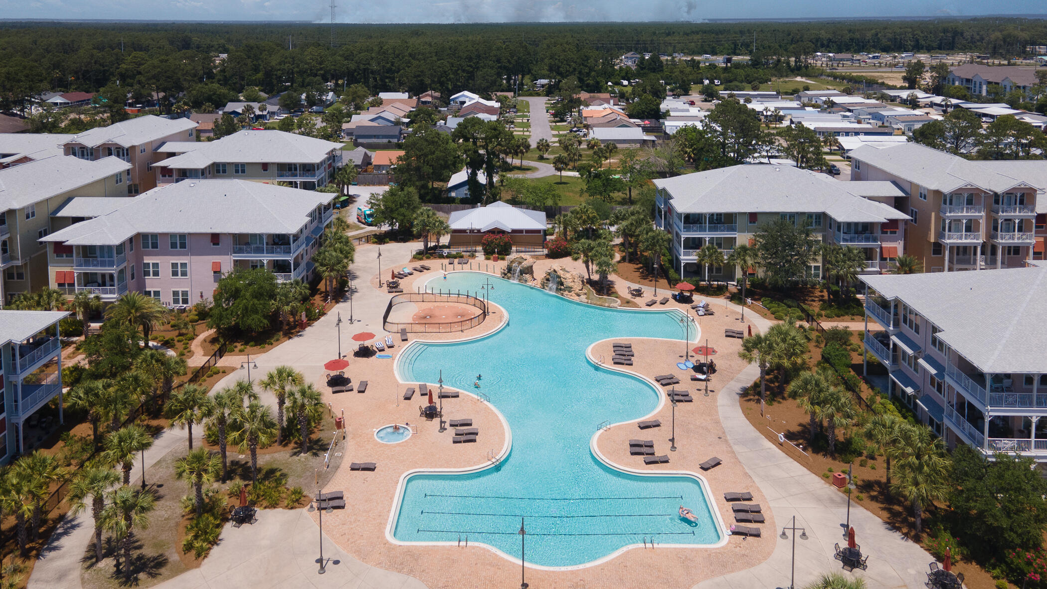Less than 2 miles from the emerald shores is this incredibly upgraded 2-bedroom 2 bath condo featuring a custom entry way, kitchen and master bath, you won't find another unit with this amount of upgrades! This home features appliances, AC, & water heater that are only a couple of years old!! Enjoy top of the line amenities in the gated community including, state of the art exercise equipment, community room, theater room, pickleball/basketball court, hot tub, and a 1 acre zero entry pool!