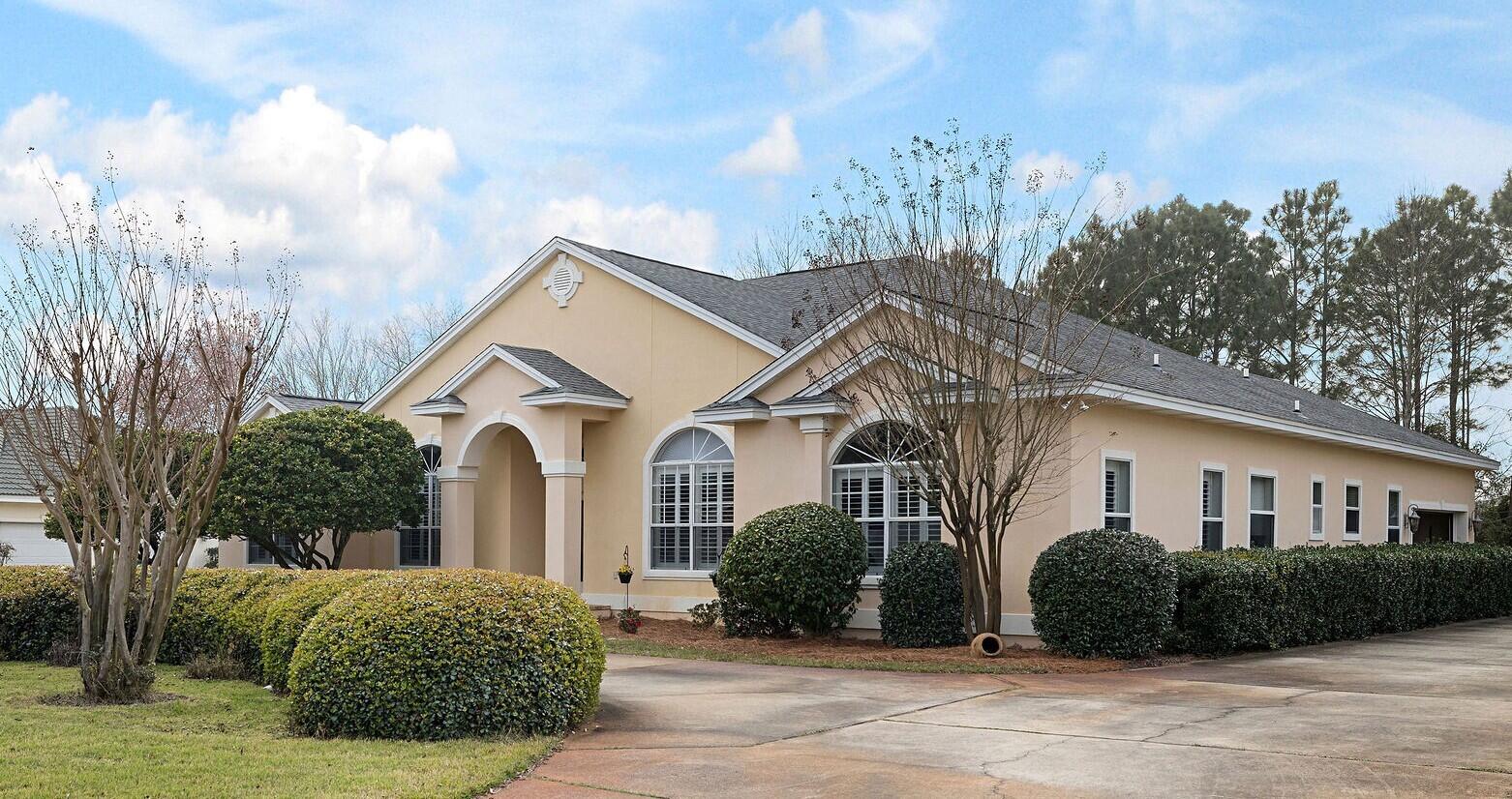 Wow!! BIG...at 2859 sq. ft. with 4 bedrooms/3 full baths. Bedroom converted into an office...BOLD...Sitting on one of the largest HIGH & dry lots in the area in the (X) zone at .64 of an acre...BEAUTIFUL...custom built by Boswell, one of the most prominent
builders of upscale homes on the entire Emerald Coast! Click on the photos to discover the inviting foyer area leading to an 'Open concept' living space. Over $71,000 in recent upgrades and a 'Swim Spa' purchased for $24,000i n 2019 included in the sale. You'll experience a great 'Quality of Life' in this secure location in a friendly community. priced to sell...so come see it today, make it ours, & love it forever!