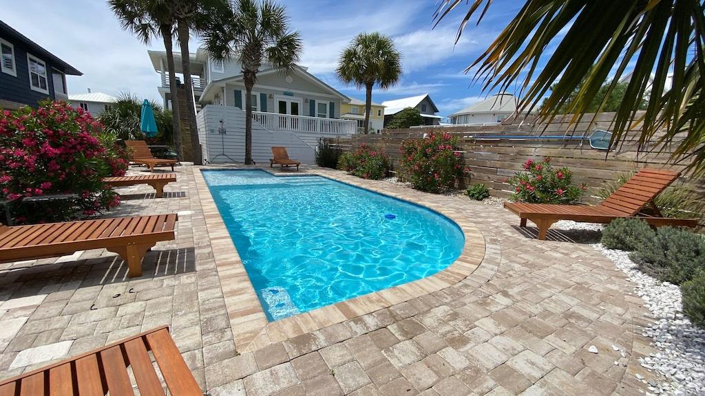 Sea LA Vie @ Grayton Beach is a Gorgeous Updated 4 bedroom, 4 bath home that sits steps away from the crystal clear waters. This Beach House is very popular and a very desirable rental because of it's location, layout, views and comfort.  This home is newly renovated & furnished with new full size heated swimming pool. This Vacation Haven also features 2 living rooms, 2 dining areas, plus 3 large porches...
There is so much space for a large family or two!
The home provides a one of a kind floor plan that allows for adults and kids to have their own private space.