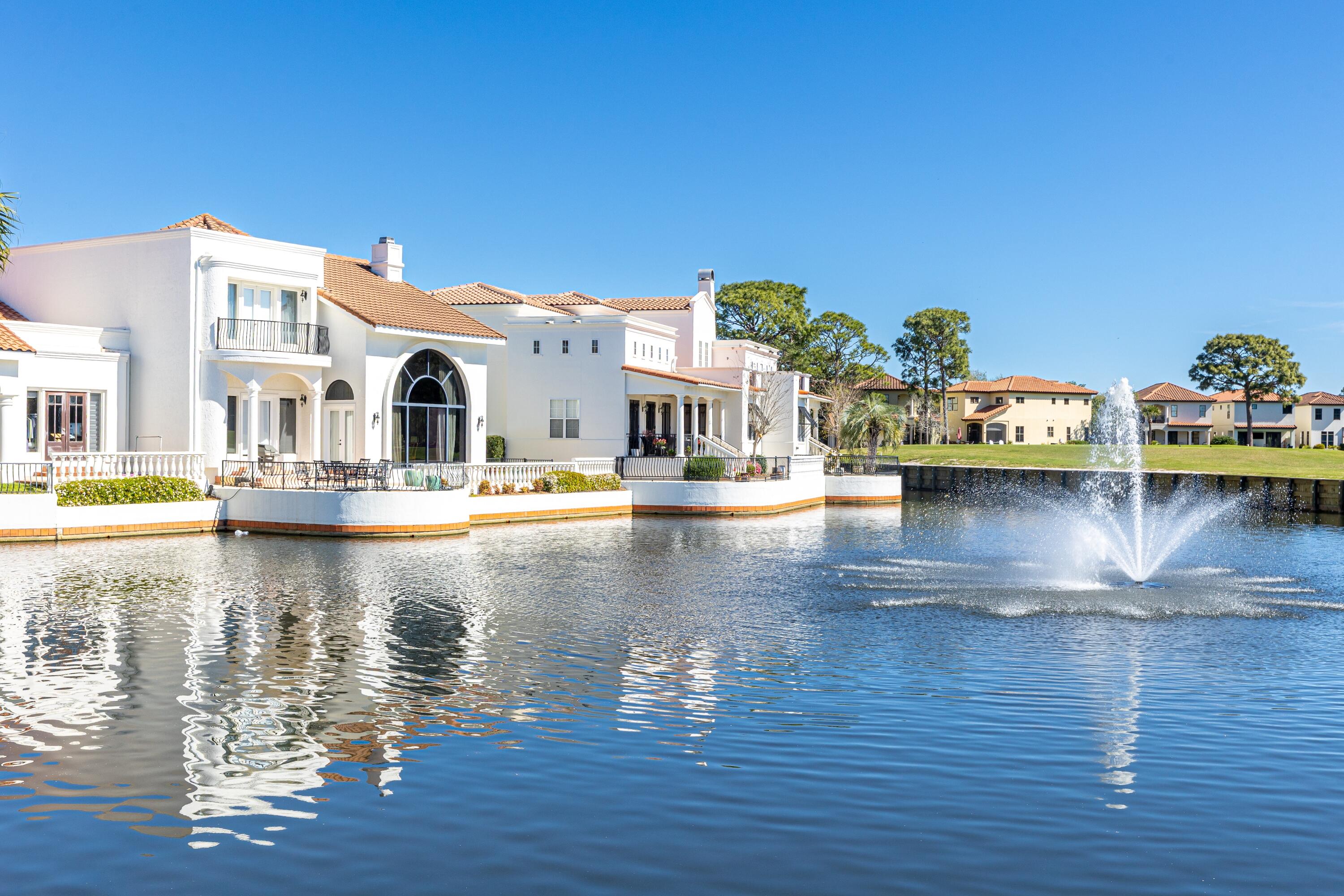 8064 Fountains Lane offers a thoughtfully renovated three-bedroom, three-and-a-half-bathroom home with an upscale coastal design.  This home as been completely renovated to include new bathrooms, new countertops and fixtures, new flooring throughout and Thermador and Kitchenaid appliances.
Floor to ceiling windows offer expansive views of the lake and golf course, bringing natural beauty into the living spaces. This home combines modern comfort with refined design in a serene setting.
The Fountains is located directly across from The Village of Baytowne Wharf in Sandestin and is a low density, gated community offering security and convenience to shopping, dining, and annual events. Schedule your showing today.