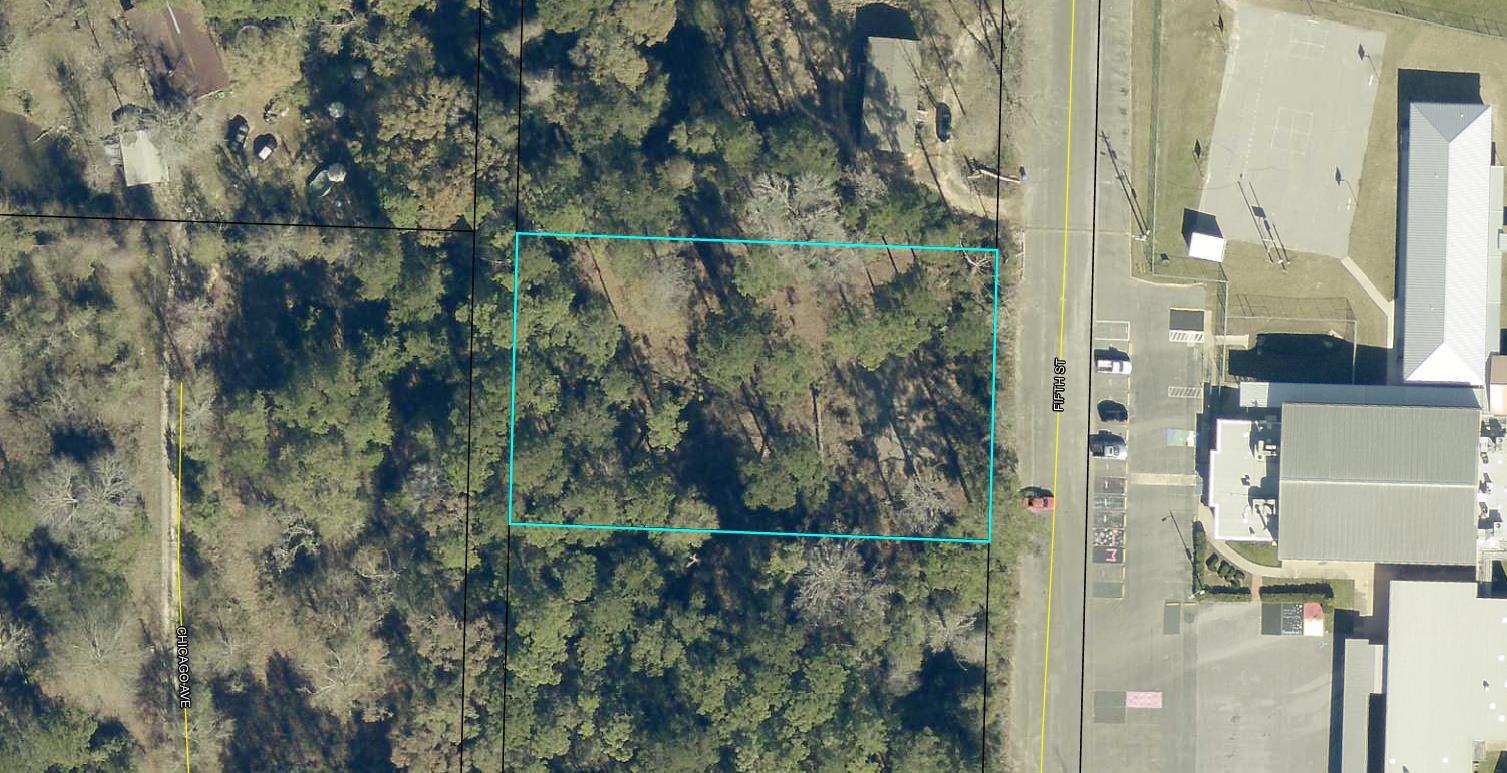 Are you looking for a piece of property to build your dream home in or around Laurel Hill? Or are you a builder looking for an investment property? Well this parcel might be just what you are looking for. This 0.87 acre parcel is just right for building a large family home or can be split into three lots to maximize your its potential. Located directly across from Laurel Hill High School, it has direct access to City Water, cable, and electricity. The property will require a septic system(s).  Parcel has a current survey, picture located in the documents folder. So builders/investors come check this property out and bring your offers.