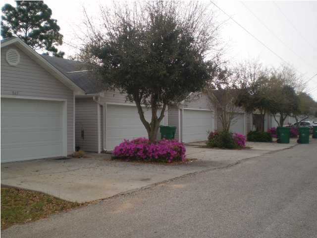 This beautifully maintained one-story townhome featuring 2 spacious bedrooms with 2 bathrooms and 2 car garage with room for full-sized vehicles! Step inside to find laminate wood flooring in the inviting living area, ceramic tile in the kitchen, bathrooms, and hallway, and cozy carpeted bedrooms for added comfort.
The master suite boasts a generously sized walk-in closet, perfect for all your storage needs. Ideally situated between both military bases, this home offers unbeatable convenience for commuting, shopping, and more. Cat or small dog allowed with non-ref pet fee. All Coastal Realty Services residents are enrolled in the Resident Benefits Package (RBP) which includes renters insurance, HVAC air filter delivery and our best in class resident rewards program and much more!