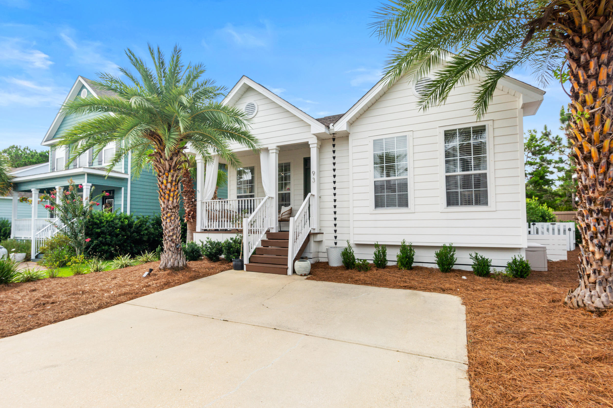 This pristine coastal cottage, ideally situated just steps from the Santa Rosa Golf and Beach Club, combines modern luxury with coastal charm for the perfect beach home.  Located in the quaint community of Santa Rosa Golf Villas on West 30A, this picturesque home is just half a mile to the beautiful emerald waters and white sands of the gulf, and less than a 5 minute bike ride to the nearest public beach accesses.  Finely appointed with custom upgrades, every element of design has been thoughtfully implemented to create a cozy yet refined space. Characterized by an open floor plan, notable features include engineered hardwood floors, marble and quartzite surfaces, natural stone bathrooms, and curated color schemes for a coastal chic design. Black stainless steel appliances, custom closet shelving, designer lighting, plumbing fixtures, and window treatments throughout further enhance the interior space.  The large master suite features a walk-in closet, and en-suite bath with a garden tub and marble shower enclosure.  The exterior boasts a completely curated entertainment oasis, with every aspect designed to accommodate a private yet playful setting, and offers a shed built to match the home for additional storage.  The fenced in backyard is decorated with Shellstone pavers, a grilling and fireplace area, and a custom built storage box to accommodate 12' paddle boards, all connected by a boardwalk.  Idyllic landscaping surrounds the backyard for privacy, and a screened in back porch completes the space to allow for indoor/outdoor living and dining.  Centrally located to the incredible shopping, dining, and lifestyle of 30A and Miramar Beach, with iconic restaurants including Shunk Gulley and Stinky's Fish Camp just a golf cart or bike ride away, and 10 minutes from the shops at Grand Boulevard, this meticulously maintained home offers turnkey coastal living on 30A.