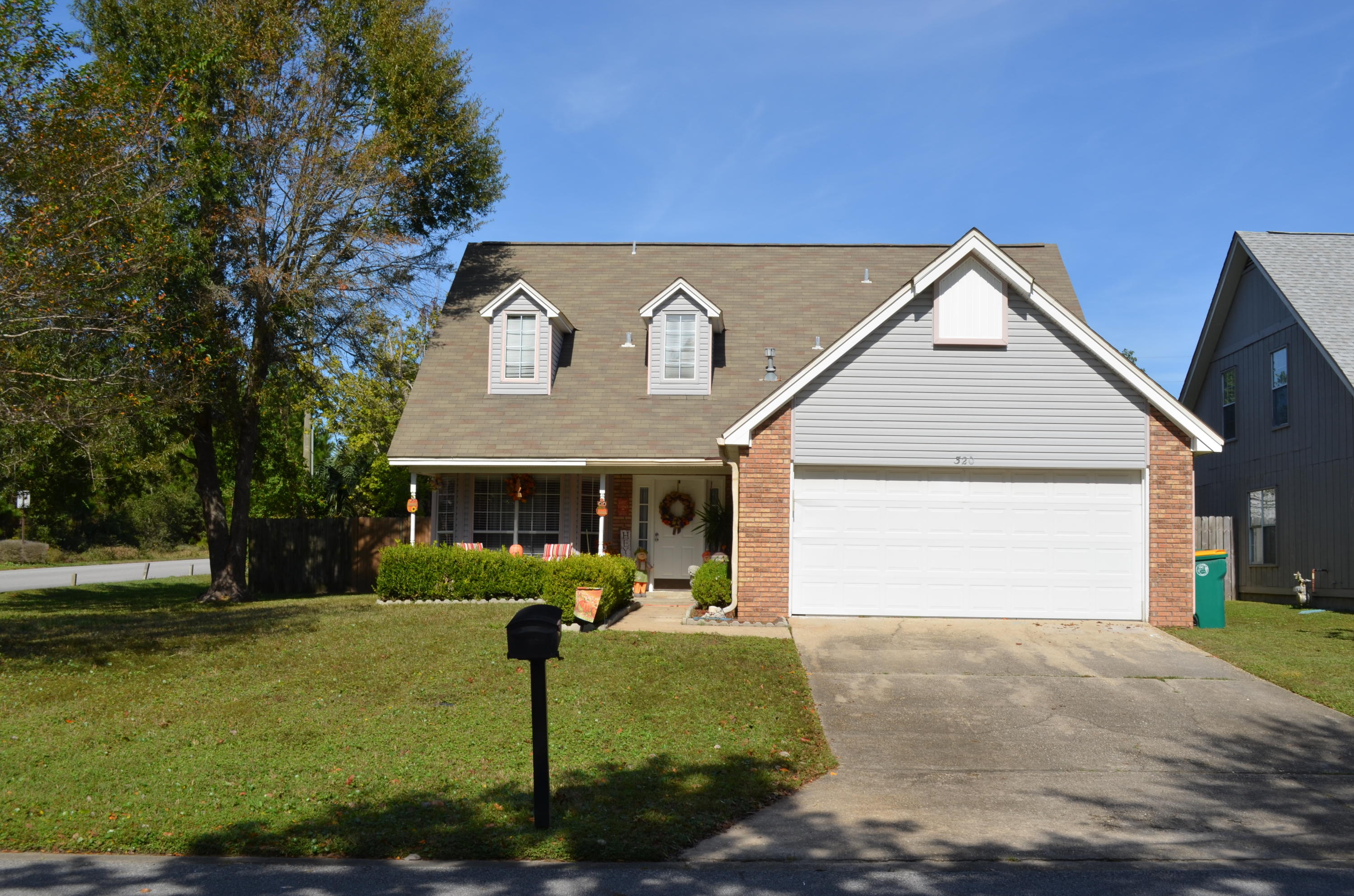 Conveniently located to Hurlburt Field and the beaches!!! This charming two story 4 bedroom 2 & 1/2 bath is a MUST SEE! This home features newly installed granite counter tops in the kitchen with all stainless steel appliances alsong side the eat-in kitchen, formal dining room with bay window, spacious living room with vaulted ceilings and gas fireplace and downstairs master bedroom with private full bathroom. Upstairs you will enjoy a cozy seating/reading area overlooking the downstairs living room with three additional bedrooms with dormer windows also located upstairs. The home has upgraded laminate hardwood floors throughput the home and tile in all wet areas. NO CARPET! Home on a great corner lot with privacy fenced backyard!