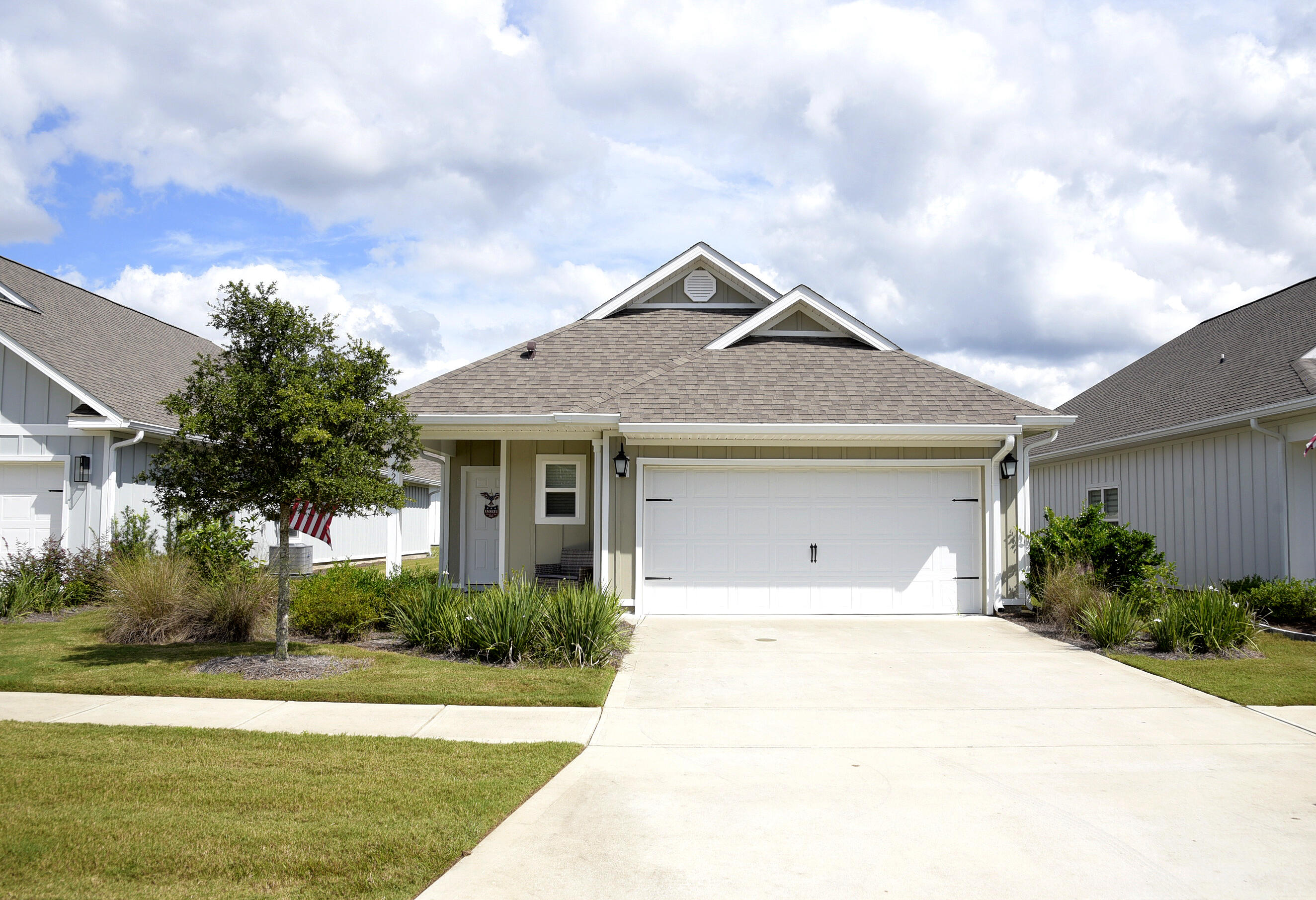 LIKE NEW!!! This one year old home has over $10,000 in upgrades! This lovely 3 bedroom 2 bath Craftsman style charmer in the highly desirable Firefly community of Hammock Bay offers you a no hassle lifestyle as your outside chores are all done for you! No mowing, no weeding, just enjoy the lovely surroundings and amenities of Hammock Bay. Situated on the largest lot in Firefly, the home is already completely fenced to keep kids and pets safe. Inside there is lots of natural light and an open, inviting floor plan. In the kitchen, granite countertops, plenty of beautiful white cabinetry and a large island will be where family and friends naturally gather. A spacious screened porch, window blinds and crown moldings are among the beautiful upgrade features that make this home so inviting.