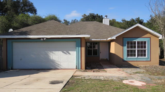 With a little love, this 3 bedroom, 2 bath REO home would be the perfect home or rental property. The home features vaulted ceilings, a large kitchen, tile flooring in the living room, dining area, kitchen and baths. There is a cozy fireplace in the living room and a privacy fenced back yard that will be great for entertaining family and friends. The location is close to all Destin has to offer! This is a Fannie Mae Homepath Property.