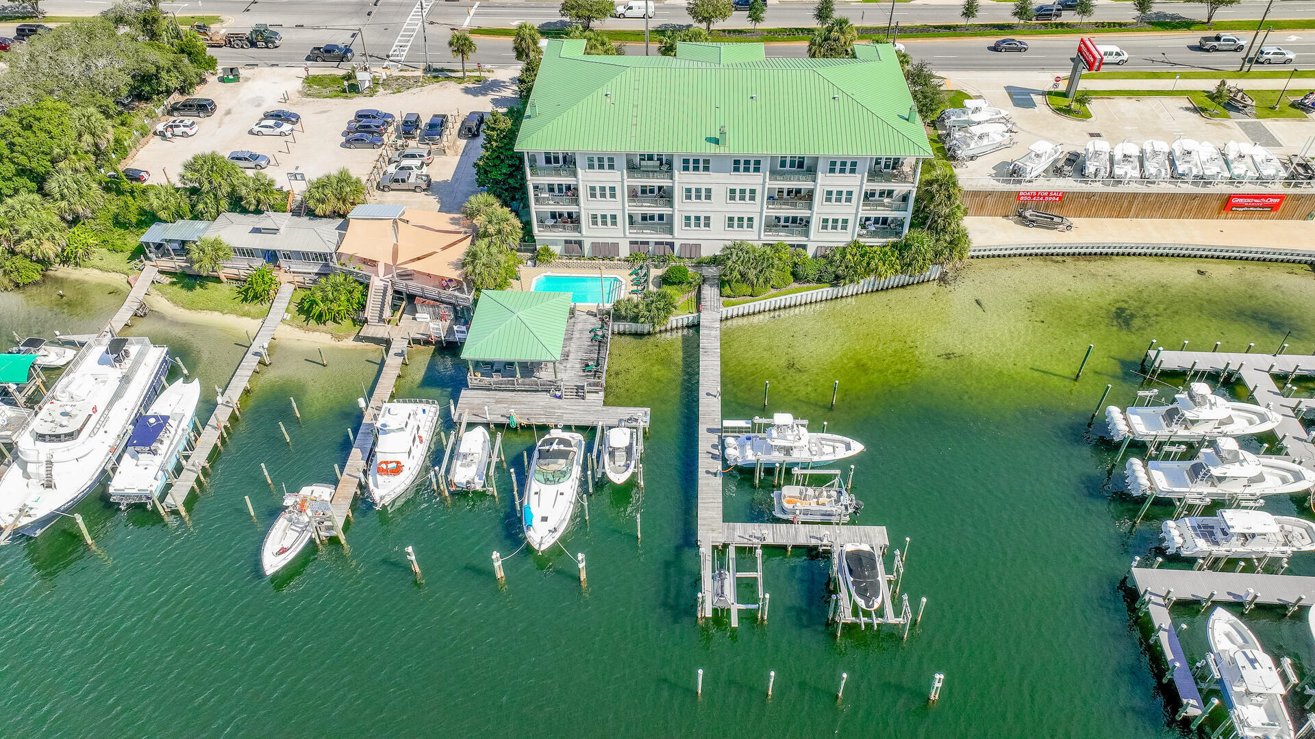 Experience luxury living at its finest in this freshly renovated, non-rental pet-friendly penthouse in Tranquil Harbor, offering breathtaking views of Destin Harbor and the East Pass. Dual balconies capture spectacular sunrise and sunset views, overlooking your private, oversized boat slip—a rare and highly sought-after feature.

Originally designed as the developer's personal residence, this penthouse stands apart as the largest and most distinctive unit in the complex, offering a level of space and craftsmanship rarely found.

The generously proportioned, open-flowing floor plan is both elegant and inviting. From the travertine flooring to the meticulously detailed raised and tray ceilings, every element reflects thoughtful design and refined coastal luxury.