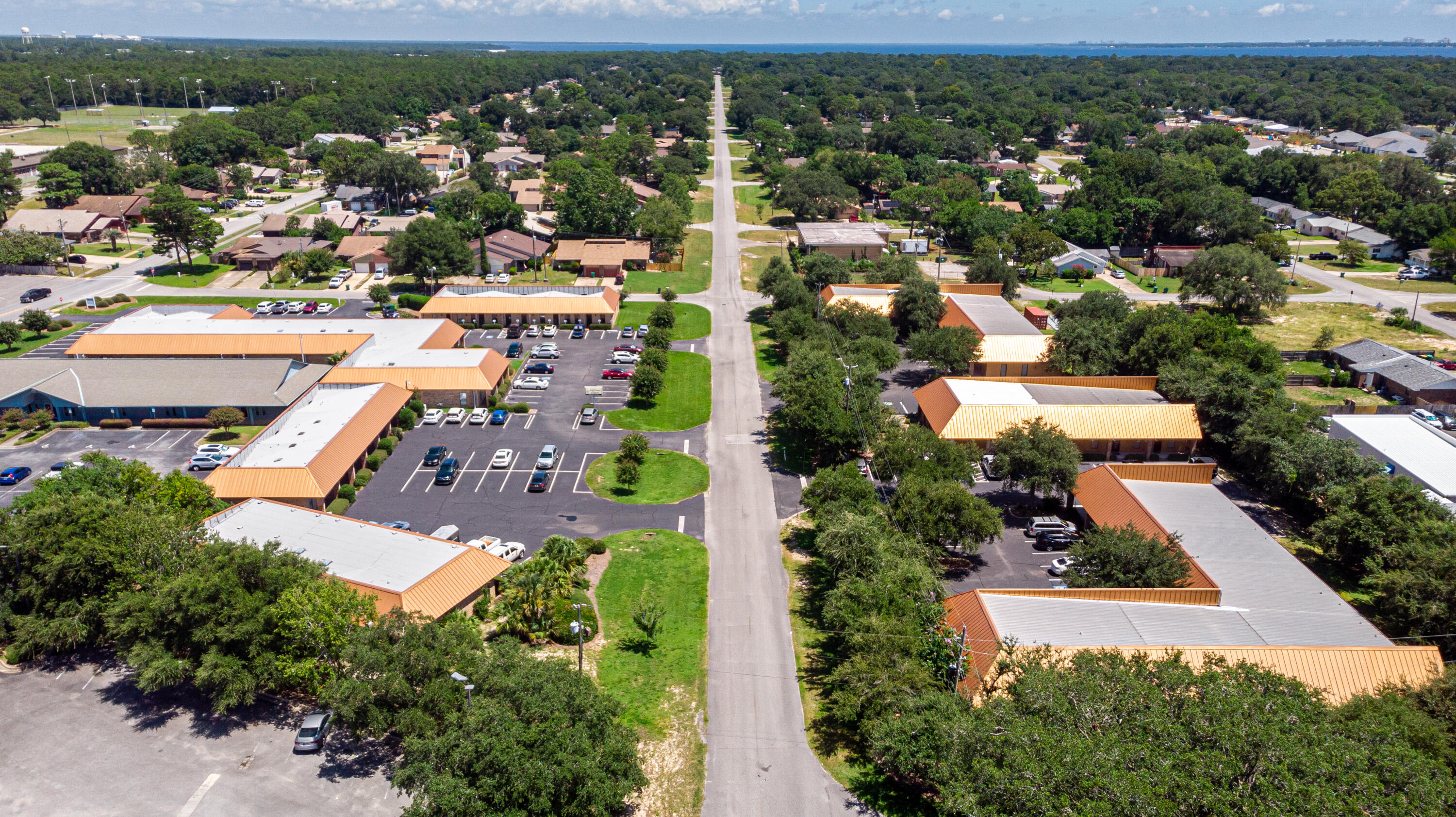 Shalimar Town Center encompasses a total area of 39,000+ square feet, maintaining a 100% lease occupancy and generating consistent income. With an impressive cap rate projection of 7%, the structure seamlessly integrates six buildings into a cohesive professional office center.
Tenant highlights include full occupancy, with the exception of one space currently utilized as a maintenance staff office. The diverse tenant mix ensures stability and reliability in income generation.
Strategically situated in Shalimar, FL, the prime real estate location is in close proximity to key destinations, including the Destin-Fort Walton Beach Airport (10 minutes), the vibrant city of Destin (14 miles), Eglin Air Force Base (5 miles), and Hurlburt Field Air Force Base (6 miles).