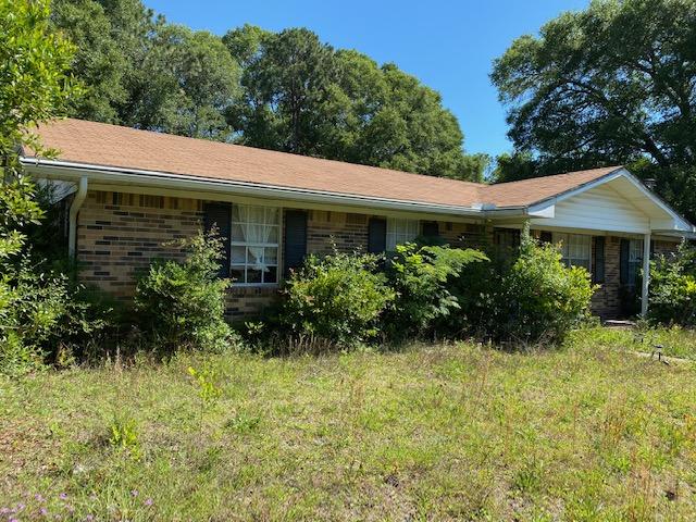 Yard clean up and a little TLC is what this home needs! Three bedrooms, two bathrooms, eat in kitchen, great room and family room in this brick home. Located on a corner lot in central Crestview. Sold AS-IS