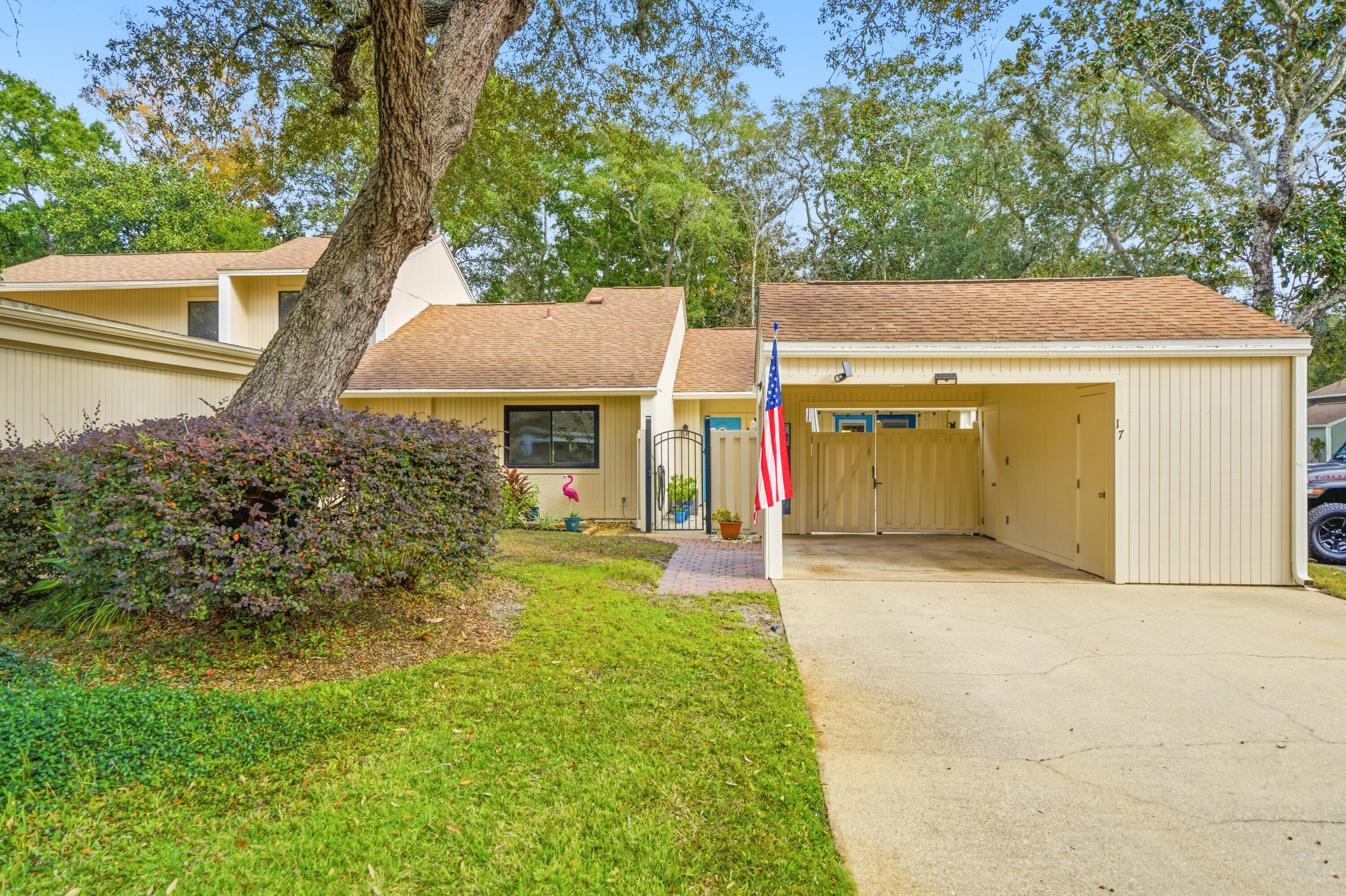This BEAUTIFULLY RENOVATED, 1-story, END UNIT townhome is *THE ONE* you've been waiting for AND comes with a HOT TUB! Welcome to #17 at the desirable Royal Oak Village that's nestled in the heart of Bluewater Bay! This 3 BR, 2 BA, 1,405 SF unit has been meticulously cared for & features a 2020 HVAC unit, 2020 water heater, a large & fully renovated kitchen with stunning quartz countertops, soft close white cabinets, and pull-out cabinet drawers! The primary bathroom has been completely upgraded with a tiled shower & glass doors, gorgeous quartz countertops, tiled flooring, a large walk-in closet, and has an infrared ceiling heater to keep you warm after showering. Enjoy having waterproof laminate flooring throughout all main living areas, tile in the 2 bathrooms, foyer, & laundry, and no carpet! The Florida room has been professionally transformed into a 3rd bedroom with a walk-in closet, barn doors, and has an entry/exit door leading to the back covered/open porches and hot tub within the privacy fenced backyard. This bedroom is currently being used as an office space but could also be used as a gym, play room, craft room, etc... The spacious living room features a cathedral ceiling and a wood burning fireplace with beautiful pebbled rock tiles surrounding the face of it and shiplap up the and around the wall. Down the hall, there is another guest bedroom with a large walk-in closet. It's located in the front of the unit by the full guest bathroom, laundry closet, and primary bedroom. The *fully replaced & upgraded electrical panel* is located in the hallway by the laundry room closet. The very spacious primary bedroom is located in the back of the townhome and has French doors leading out back to the hot tub that has been immaculately cared for. Enjoy the serenity of relaxing in it or entertaining your friends & family with it. You can also entertain your guests in the front privacy fenced courtyard area as well as the in the backyard. This townhome allows you ample space to easily host small or large gatherings! Be the host with the most! Everything about this townhome, both inside and out, is sure to please! Whether you're a 1st-time home buyer, downsizing, investing, retiring, or wanting a 2nd home near the beach/bay, this no-maintenance property is exactly what you need and will enjoy! Don't miss your opportunity call Unit 17 all yours before it's too late! Check out the virtual tour and then schedule your private tour today!
 
More wonderful features: 
* All the windows and exterior doors were replaced in 2018 & 2020. They are double paned and there are fabric hurricane shield protection covers for the front door and window that are located in the carport storage room that will convey with the home. Having these upgraded windows & coverings all you to receive all the wind credits for home insurance purposes.
* The washer, dryer, kitchen appliances, hot tub, and the sun shade above the hot tub will all convey with the home. 
* There is a large & spacious storage closet in the carport along with a pull down ladder in the carport for easy storage access to the attic area above it. 
* The electrical panel has been completely replaced and upgraded which is very desirable for home insurance!!! :) 
* Home insurance quote is $2,077.30/year from Affordable Home Insurance. 
* The HOA is $277 per month and covers the replacement of the roof, grounds keeping, irrigation, the maintenance to the exterior of the unit, and maintains the roads with ample overflow parking spaces. There are 3 overflow parking spaces right next to this unit for easy access when needed! There is no one-time new buyer's fee. It is managed by Panhandle Management. 
* Short-term rentals are not allowed. (Lease terms must be for 6 months or more.) 
* ROYAL OAK VILLAGE is located just minutes to all the fun activities within Bluewater Bay such as the tennis center, pickleball center, golf course, & 3 swimming pools! (These all require separate paid memberships and are not part of the HOA amenities.) It's also within very close proximity to multiple restaurants, a grocery store, a pharmacy, banks, dental offices, doctors offices, an elementary school, and much more! 
* At the end of Bay Drive is one of the many locals' favorites - L. J. Schooners! It has a restaurant, bar, marina, and boat/jet ski/ kayak/paddle board/canoe launching area! Definitely check it out!
* The stunning beaches of Destin are right over the mid-bay bridge - just 9.5 miles away!