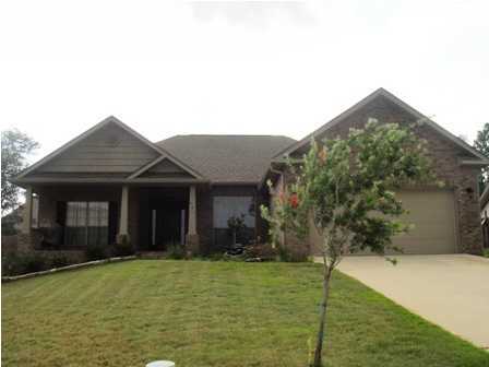 This beautiful unfurnished 3BR/2BA home is located in Crestview, Florida just south of I-10, which makes for an easy commute in and out of town. This home is situated in a cul-de-sac and features a large open patio out front so that you can sit and enjoy those cooler evenings. The interior features include vaulted ceilings in the living room, a formal dining area, and an open kitchen with plenty of cabinet space, a smooth top stove and a side by side refrigerator.
The master bedroom boasts trayed ceilings and plenty of natural lighting. In the master bathroom you will find his and her sinks, as well as closets and a separate tub/shower. The exterior features include a fenced yard for privacy, a two car garage, and plenty of parking space in the driveway. This home is pet negotiable with approval and deposit