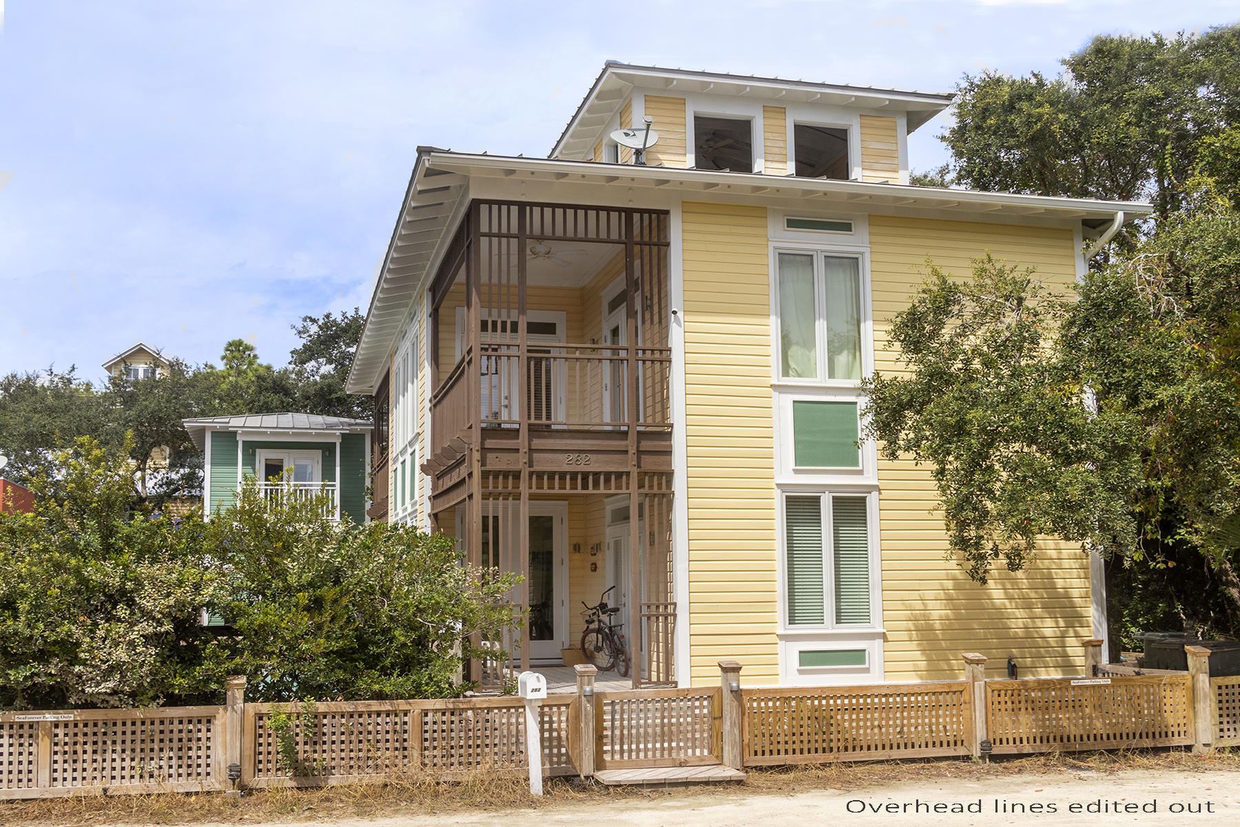 'SeaForever' is a spacious Beach Cottage with separate Guest Cottage and heated pool, just steps from Seaside restaurants and shopping.  In the Beach House, downstairs bedroom, Living Room/Kitchen that spill out to open porch overlooking pool.  Second floor has Master Bedroom and two additional bedrooms (each with bath) and stairs leading to tower 'hatch' that has Tower Room w/summer kitchen offering Seaside and Gulf Views.  Lots of opportunity to renovate and make it your own.  Artwork, model boat and personal items excluded.  ***Buyer is responsible for personally verifying details about this property.  Any information contained in this listing is believed to be accurate but is not guaranteed.***