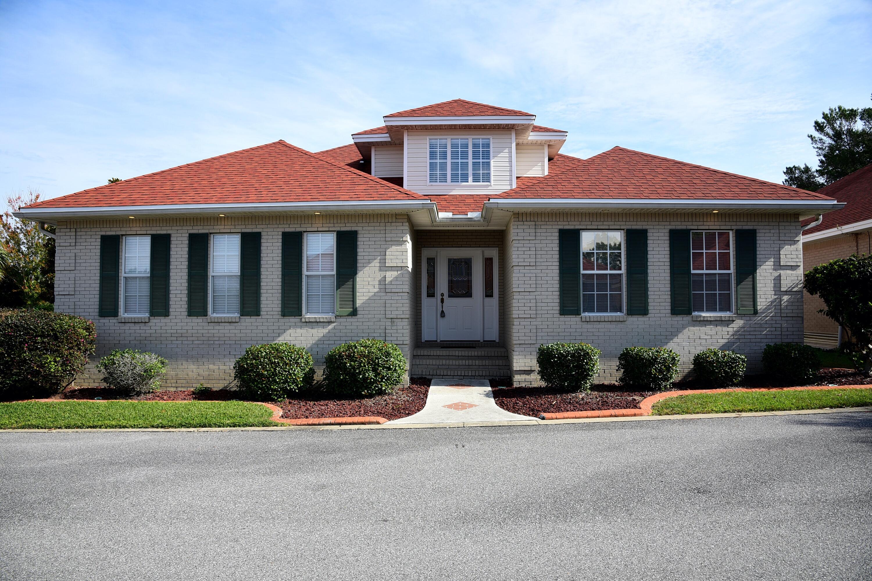 This Custom Built Home located in Magnolia Plantation located on a Corner Lot is a Must See!! Features All Brick & Professionally Landscaped. Patio has Brick Pavers. Stained Cement edging around shrubbery adds the finishing touches. Small Patio area with a retractable Awning has been added. Upon entering the foyer with 18' ceilings leading into 9' ceiling throughout home the Family Room Features a Corner vent less Fireplace, Custom Blinds and Laminate Wood Flooring. The Kitchen features 42'' Custom Cabinets, Stile Stone Countertops, Pantry & stainless appliances (ice maker & Jetted tub not warranted). NO SMOKING UNIT. SMALL PET CONSIDERED WITH OWNERS APPROVAL.& NON REFUNDABLE PET FEE NO CATS. Any person 18 years old or older must apply separately. Tenants required to carry renter's liability insurance