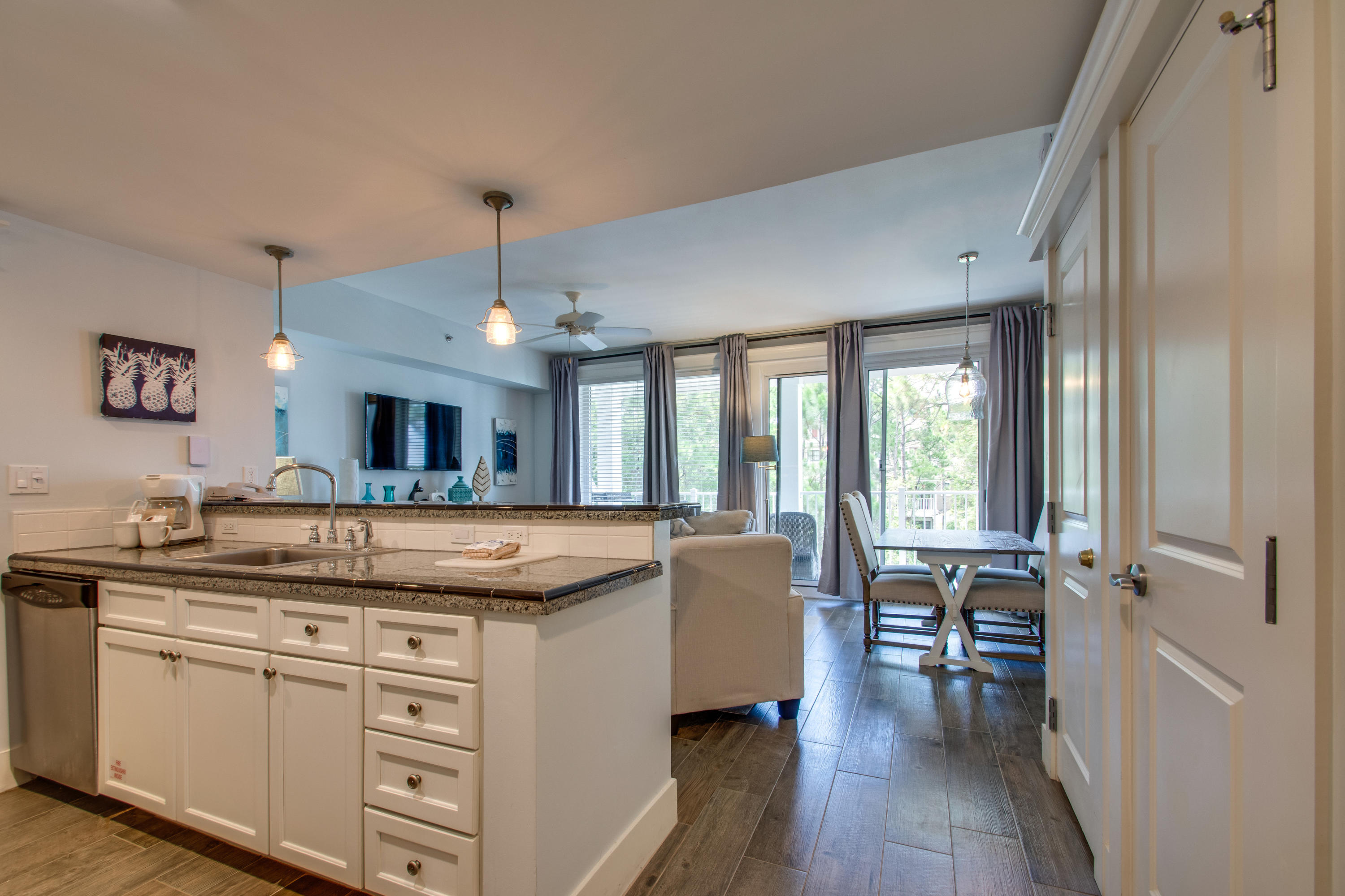 Looking for the perfect 1-bedroom, 2-bathroom condo? This one has everything you want & more. With recent updates, this 2nd-floor condo welcomes you & your guests into a serene space with a coastal feel & bay view. The entire condo has beautiful hardwood style tiled flooring & was freshly painted. The kitchen was recently updated with refinished cabinets and all new appliances. Enjoy an afternoon looking out to the bay from the cozy living room featuring a flat screen t.v., coastal decor, & ample seating. Sip your coffee while sitting on the balcony looking out to the bay. This A-rated unit is being sold fully furnished. Owners & guests will enjoy the convenience of being in The Village of Baytowne Wharf with lots of shopping, dining, and daily & nightly activities for the whole family. As an introduction to the Sandestin lifestyle, we invite our new owners to explore amenities that make Sandestin special. The listing brokerage and seller(s) are presenting the buyer(s) of this property with (2) 90-minute rounds of Tennis court time, a golf foursome at one of our three championship courses, a round of golf for up to four (4) players and an invitation to "Club Night" at the unrivaled Burnt Pine Golf Club.

Sandestin Golf and Beach Resort is a major destination for all seasons and all ages, and has been named the #1 resort on Florida's Emerald Coast. This magical resort spanning over 2,000 acres is comprised of over 70 unique neighborhoods of condominiums, villas, town homes, and estates. The resort features miles of sandy white beaches and pristine bay front, four championship golf courses, a world-class tennis center with 15 courts, 4 resort swimming pools (and 15 private neighborhood pools), a 123-slip marina, a fully equipped and professionally staffed fitness center and spa, meeting spaces and The Village of Baytowne Wharf, a charming pedestrian village with events, shopping, dining, family entertainment and nightlife. For true golf cart community living, Grand Boulevard is just outside the resort gates and provides access to additional shopping, dining and entertainment  all without traveling on Hwy. 98.  Come to Play, Stay for Life!