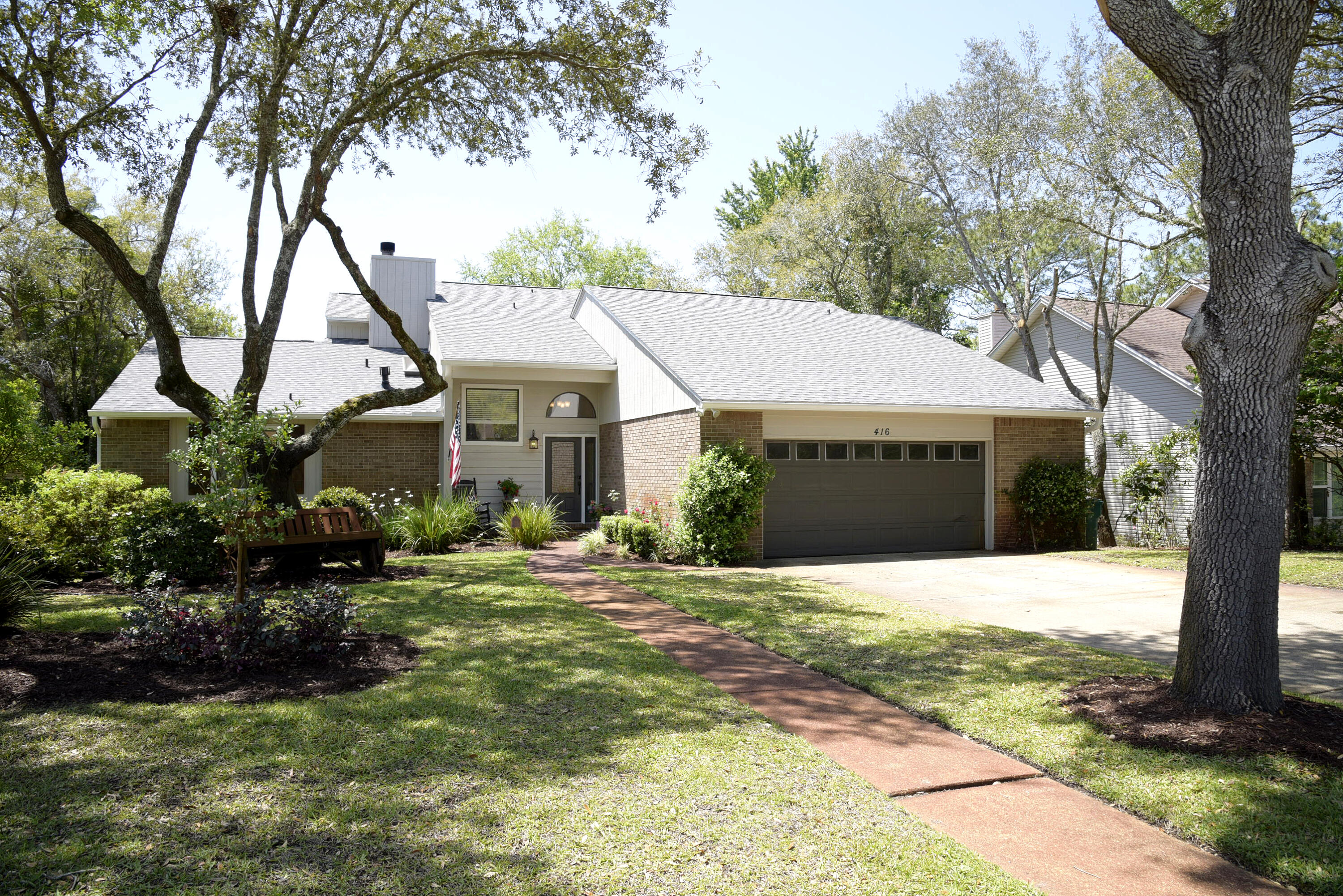 Exquisitely updated, 3br/2ba, lake front home in desirable Bluewater Bay. Marble tile and updated light fixtures immediately welcome you upon entering. Updated features include hardwood flooring, updated cabinetry, tall baseboards, subway tile and so much more! Kitchen has been opened up allowing for easy access to the dining area, as well as a lovely view of the water. Living room is open and accented with lovely tiled corner gas fireplace. Kitchen sports beautiful granite countertops, white shaker cabinets, custom pendant lighting, all stainless appliances, and a large walk-in pantry. Master suite is situated on the first floor and is made up of 3 separate rooms: large bedroom with sliding glass doors leading to back deck; a separate room perfect for a small office, dressing room,  or media room; and a large master bathroom with all the fine finishes: marbled tile, updated light fixtures, granite countertop, & white shaker cabinets. A walk-in shower, jetted tub, 2 separate walk-in closets, double vanity and separate toilet can be found here. 2 additional bedrooms located on the upper level add great additional living space. Upstairs bathroom has also been updated with marbled tile, granite countertop, and cabinetry. Bathroom offers a seated walk-in shower and linen closet. Back downstairs, the open back deck with sky lighting runs the length of the home and provides a perfect space to relax and enjoy the water view. Even the garage has been given special attention with 5ft tall cabinets installed along one entire wall providing ultimate garage storage. With its close proximity to schools, shopping, Eglin AFB, and those beautiful white sandy beaches of Destin, this home is a definite must see!! Owner will consider pets with restrictions. Any pet must be spayed/neutered, housebroken (no puppies) and current on all shots. Requires a non refundable pet fee. NO SMOKING! Any person at least 18 years old must apply separately. Tenants required to carry renter's liability insurance. Lawn care provided by homeowner.