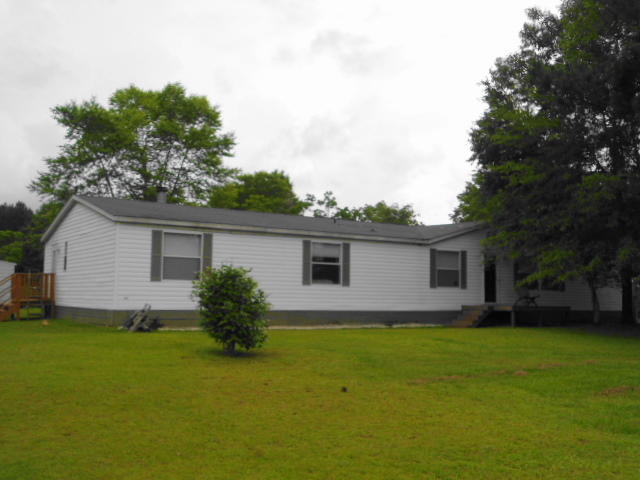 This is a SHORT SALE. No offers will be considered until property has been on the market 15 days. Beautiful hilltop 2003 manufactured home with 4 bedrooms and 3 baths on .8 acre in the New Harmony Community. Home was ordered and built with customized and a lot of upgrades, more than usual home. Dream kitchen with island, Jen Aire range is dual fuel-gas stovetop and electric/convection oven with features for bread proofing or making jerky and dehydrating fruits and vegetables... Super-size master bedroom, sitting area, two large walk-in closets, spacious bath with garden tub and shower separate. Bedroom #2&3 have a 'Jack and Jill'' bath split between them, bedroom #4  with hall full-bath.  Comfortable den for the kids...This would be a great location for Eglin AFB workers or those working in the Mossy Head