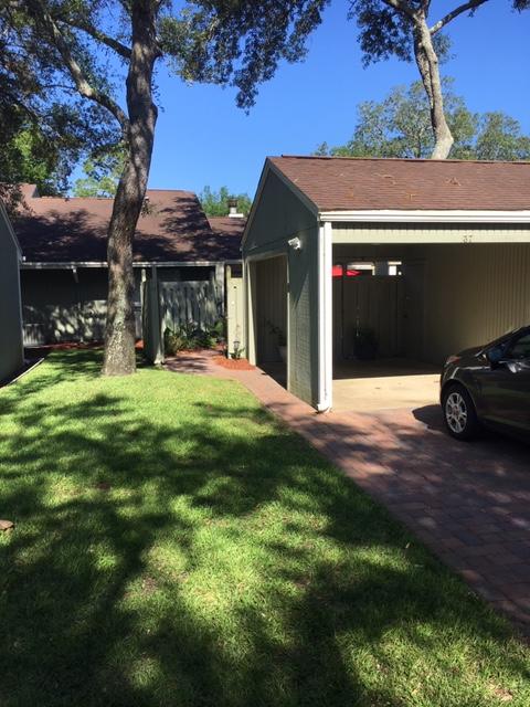 Nice Townhome in the heart of Bluewater Bay There is an inviting courtyard as you enter the privacy fenced entrance from the covered carport/ storage area. The interior is laid out with 2 bedrooms, 2 bathrooms, tiled floors and a spacious kitchen that comes with stainless steel appliances. There is a walk in shower in one bathroom and tub/shower combo in the other. This townhome has been very well cared for an is in ''move in '' condition. There are vaulted ceilings, a wood burning fireplace, nice fixtures and plenty of large windows for natural light throughout the home.There are walk in closets, a breakfast bar, nice wood cabinets, a front storm door and multiple gathering areas to relax. & read or watch your favorite show!Owner will consider small dog only,$300 pet fee & $300 pet deposi