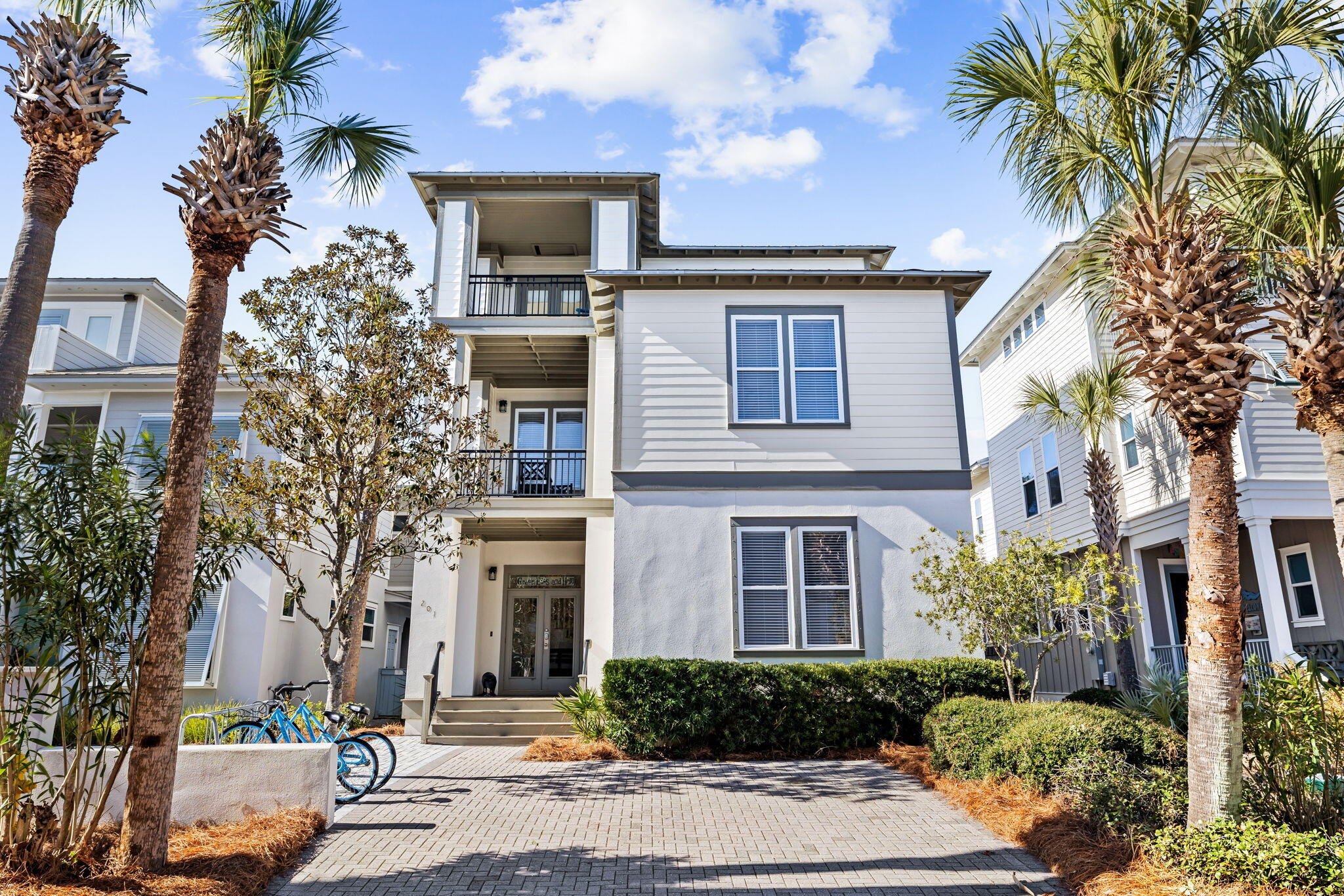 Nestled within an exclusive waterfront community on the sought-after eastern stretch of 30A, this stunning three-story home is perfectly positioned between the world-renowned Alys Beach and Rosemary Beach. Designed to accommodate large families with ease, the home offers 4 bedrooms and 4 bathrooms, providing ample living space while also boasting consistent strong rental income potential.

Built to impress, this home features hardwood floors throughout, custom cabinetry, and chef-grade appliances. Recent renovations include new pool decking, a new pool heater, fresh interior and exterior paint, updated bunkroom, and new furnishings, all thoughtfully completed to elevate comfort and style. The third floor is an entertainer's dream, complete with a wet bar and swing, creating the perfect space for hosting gatherings or enjoying breathtaking sunset views.

Step outside to your private courtyard oasis, where a sparkling pool invites relaxation and leisure. From here, walk right out of your back gate and you're just steps from private deeded beach access. The home also boasts a large laundry room, ideal for both family living and vacation rental needs.

Living here means embracing the coveted 30A lifestyle, a harmonious blend of luxury, relaxation, and community. From the charm of nearby boutique shopping and dining to endless outdoor adventures like biking along scenic coastal trails or paddleboarding on emerald waters, every day feels like a getaway. Whether you're seeking a serene retreat or an investment in paradise, this home captures the essence of 30A living at its finest.