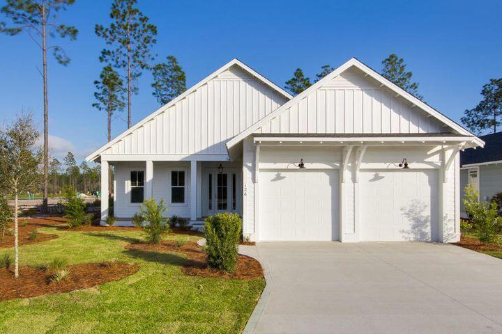 The Ficus floor plan, 4 bed, 3.5 bath, with a 2 Car front load garage. This home features Quartz counter tops throughout, Medallion wood flooring throughout,  10'ceilings,lap and gap accents, under cabinet lighting in kitchen,crown molding throughout,Wolf/SubZero appliance package, and gas stub out with a poured pad for your BBQ grill just outside your screened porch. Watersound Origins is a family friendly community with golf course, pool, exercise room, canoe/kayak launch at Lake Powell and much more!
