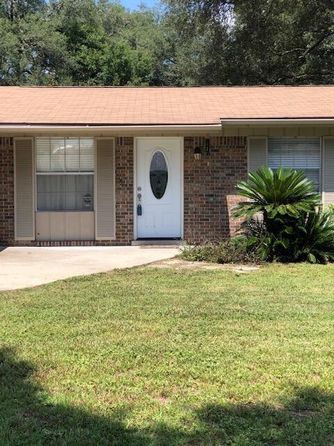 OPEN HOUSE Sunday 10/23 from 1:00-3:00! Looking for a 4 bedroom home?  Don't miss this one located in the heart of Niceville that's been totally updated in the past couple of years. The great room has LVP flooring and plenty of room for oversized furniture. You'll love the light and bright tiled kitchen with white cabinets and stainless appliances. The sliding glass door in the dining area leads to a wonderful screened porch. The master bedroom has an en suite bath with a large tiled master shower and the other bedrooms share the hall bath.  Situated on a corner lot this home has a huge fully fenced backyard with storage shed. Roof is 2010 and HWH is 2015. Call today for your appointment to view!