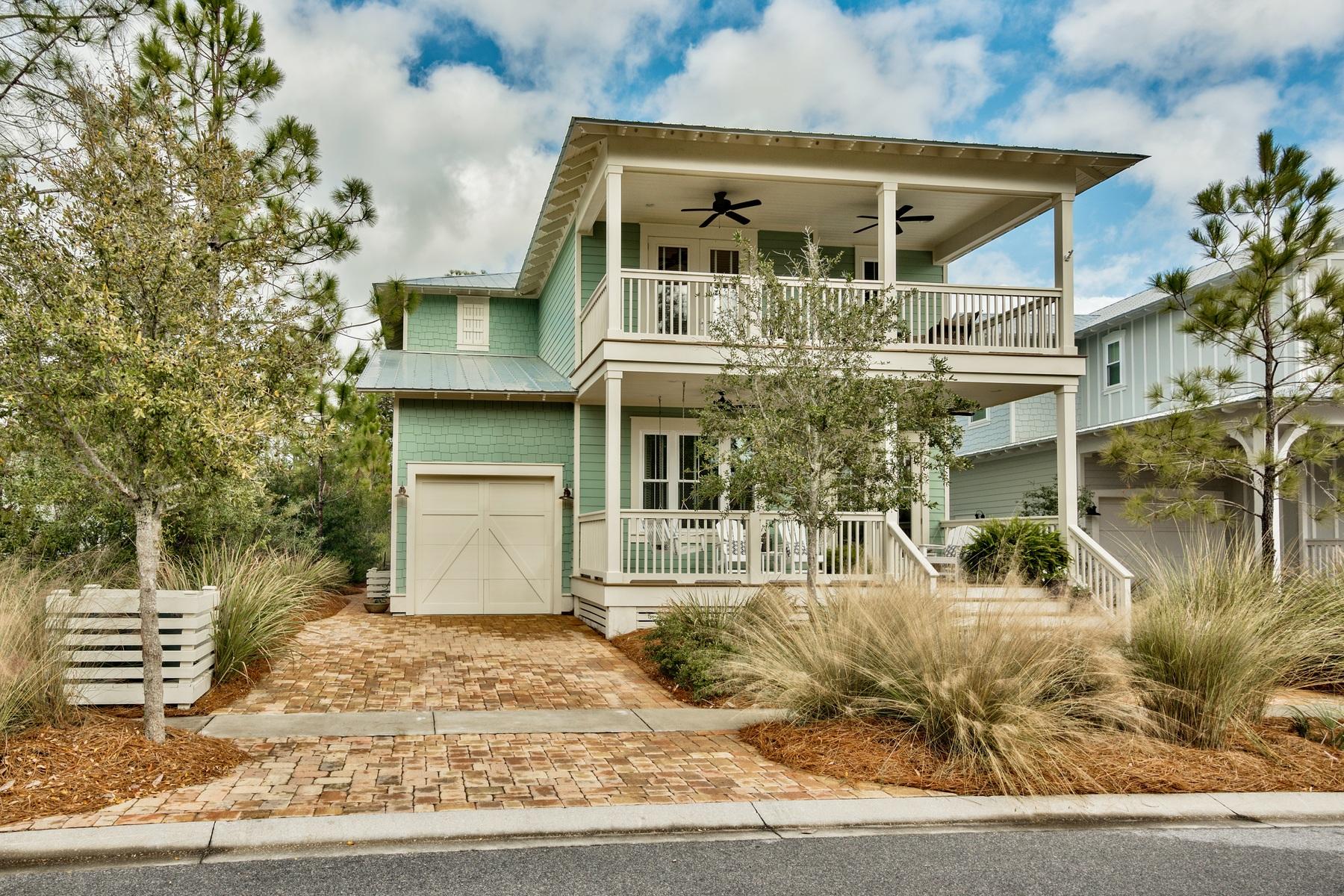 This amazing four-bedroom, four-and-a-half bath home with one-car garage is for sale and is nestled next to two preserve areas in NatureWalk at Seagrove in beautiful South Walton, FL. This home has numerous upgrades to the interior and exterior, including hardwood floors, screened back porch, built in bunk beds, cabinets and much more. The deep front porch welcomes you as you walk up to the home. Inside you'll find a formal dining room to the left and a half bath on the the right. The kitchen, living room and another dining area are all open and perfect for entertaining and family get togethers. The kitchen has stainless appliances that include an ice maker, built in microwave, granite countertops, tile backsplash and a hot water dispenser.The living room has speakers in the ceiling and access to the back, screened porch. The sellers upgraded the back patio with pavers and a custom fire pit in addition to an enclosed outdoor shower with metal roof. The back porch and patio are ideal for grilling and spending time with family. A quiet lush nature preserve backs up to the home so privacy is an added plus.The first floor has the grand master bedroom off the living room. The tiled master bathroom has dual vanities, a walk-in shower and separate jetted tub. The walk-in closet is large and has a separate area for storing luggage.  A full size laundry room with washer and dryer, as well has a sink and custom cabinets are located on the first floor as well. Upstairs will you find three more bedrooms, including a junior master bedroom on the front of the house with access to the balcony overlooking another preserve area in front of the home. All guest bedrooms have their own full bathroom. The loft bedroom has built-in bunks, which are great for kids and grandkids with shelving and their own space to watch a movie or play games. The one-car garage has been turned into a Man Cave with an in-wall AC/heating unit for year round comfort. NatureWalk is ideally located next door to the South Walton Publix and within walking and biking distance to all the shops and restaurants on 30A and Seaside. NatureWalk has the Gathering Place and includes a resort zero entry pool, another heated lap pool and kiddie pool. There are also grills, a fire pit, hammocks and playground. All room dimensions and square footage are approximate and should be verified by the buyer.