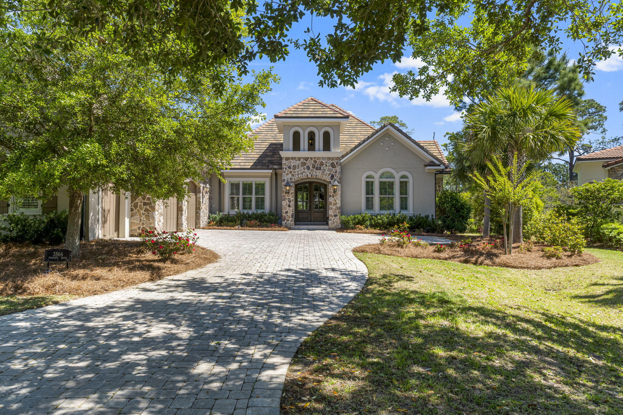 ..luxury resort lifestyle awaits you tucked away in the exclusive gated community of the Preserve at Burnt Pine in Sandestin. Fall in love with this meticulously maintained home with an open concept floor plan designed  for effortless entertaining.
The gourmet kitchen boasts granite countertops, custom cabinets, and a large center Island. Custom bookcases flank a  cozy fireplace in the family room, giving off a welcoming ambiance. Barn doors and a brick accent wall give the home a unique personality. The kitchen and the master bedroom open to an enclosed lanai, which features and outdoor kitchen, and a private pool that backs up to a nature preserve with tranquil surroundings. You must see this beautiful estate home to appreciate its exceptional design. It is the responsibility of the buyer or buyer's agent to verify all measurements, HOA Dues and what is covered by your HOA Dues.