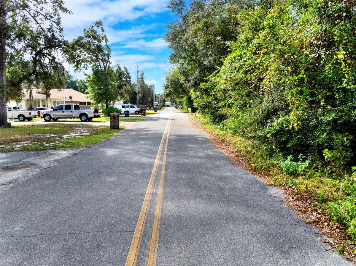 Perfect spot for your new single-family residence or tiny home! This 75x149 (.26 acre) lot is located in the peaceful Magnolia Baye area of Freeport and offers public water, electric, phone, and cable available at the road, with septic needed. Enjoy quiet country living just 18 minutes from white sand beaches, 13 minutes to bay access at Alaqua Park Boat Ramp, shopping, and incredible dining venues

The popular Horse Pavilion nearby hosts outdoor concerts and community events, adding to the charm of the area. No HOA, giving you the flexibility to bring your home and your vision to life.
A great opportunity to own your own piece of Northwest Florida! We have a builder with 5 different floorplans to choose from. Or bring your own builder. The possibilities are endless. Call today!