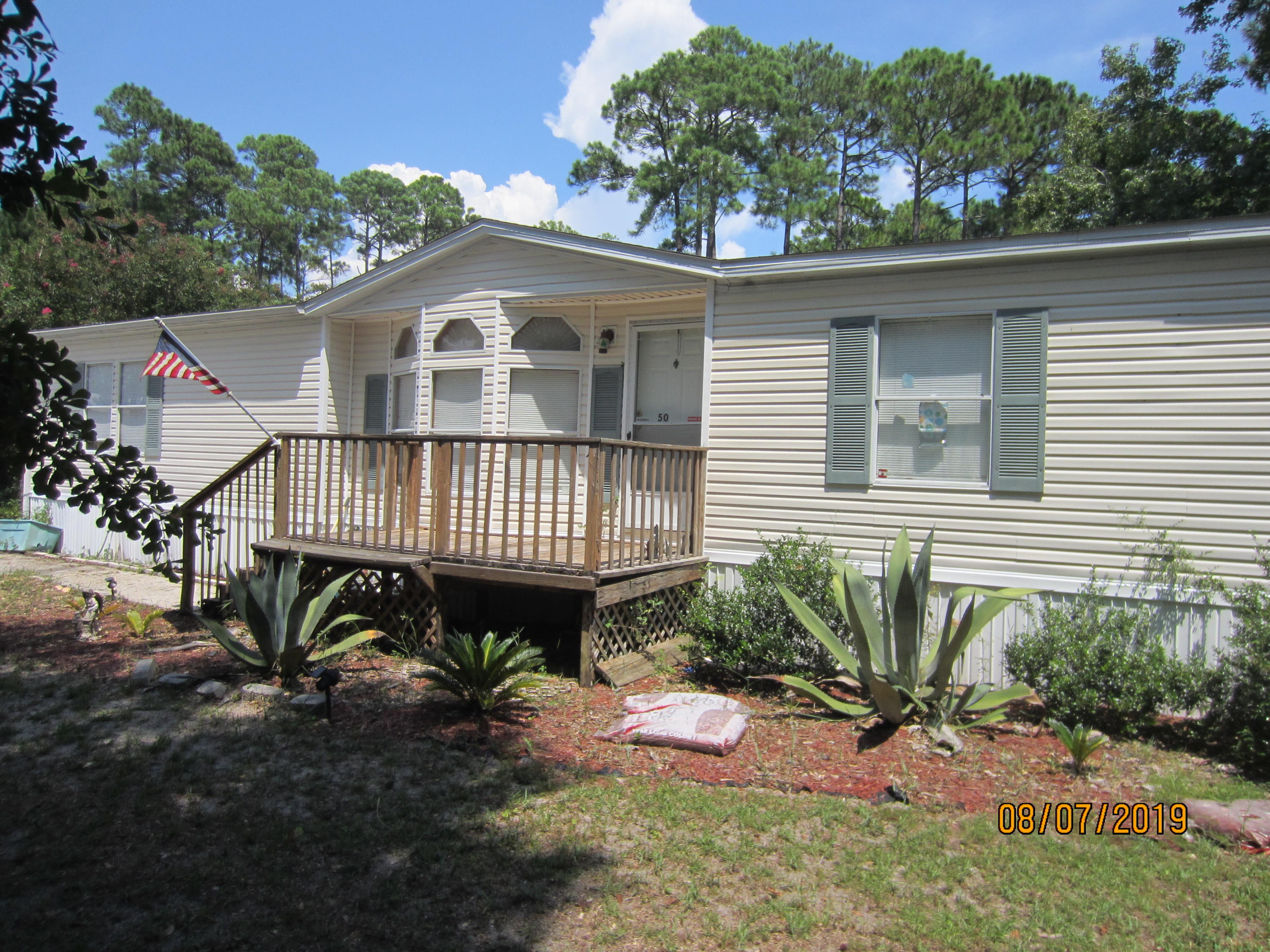 PRICE REDUCTION, Price reduction again in this Large 3BR/2BA Manufactured Home with 1759 Sq. Ft. of heated and cooled space. This is a must see... New electric stove and new build-in microwave... New hot water heater.... Beautiful and private back yard with fencing. Cozy fireplace in the Den. Two storage sheds. Established neighborhood with primarily owner occupants. Public water and sewer and also a yard well for irrigation. There is NO HOA and thus no monthly fees. Less than a block from the Choctawhatchee Bay. Property is actually four lots equal to over one half acre. Make this your permanent home or an investment for excellent rental income.